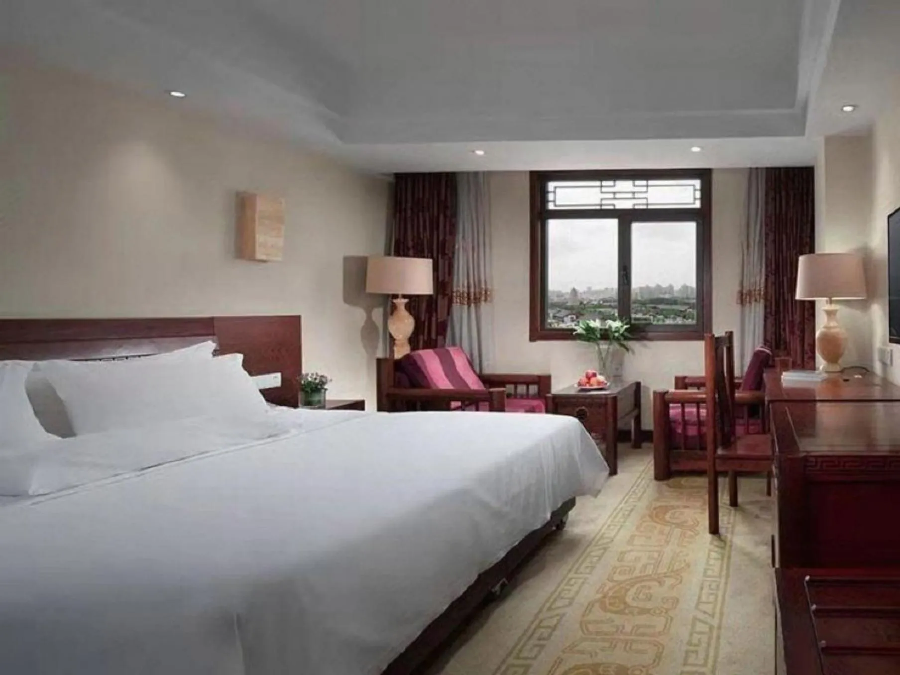 Bed in Vienna International Hotel Xi'an Dayan Tower