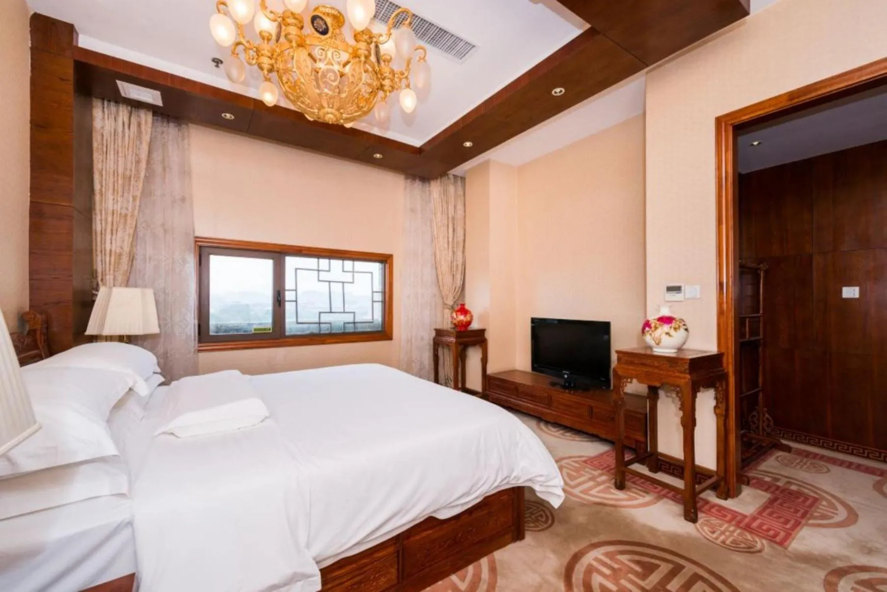 Bed in Vienna International Hotel Xi'an Dayan Tower