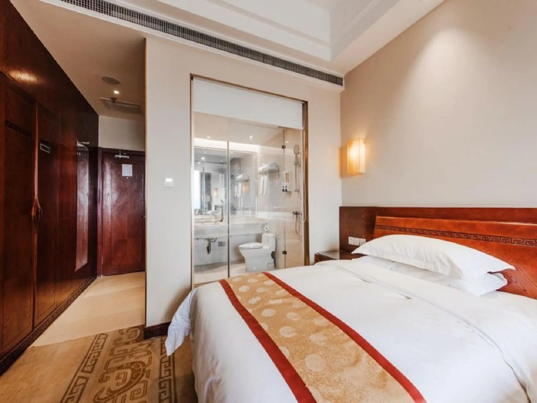 Bed in Vienna International Hotel Xi'an Dayan Tower