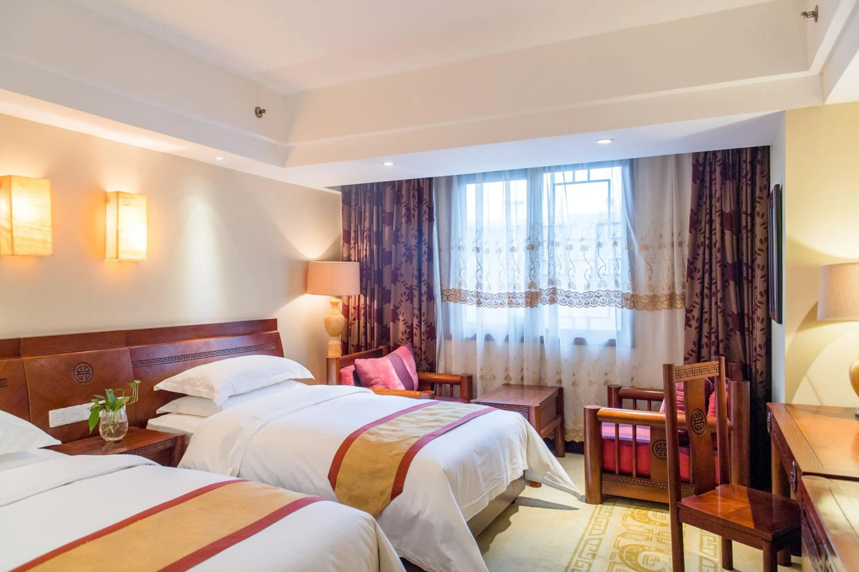 Photo of the whole room, Bed in Vienna International Hotel Xi'an Dayan Tower