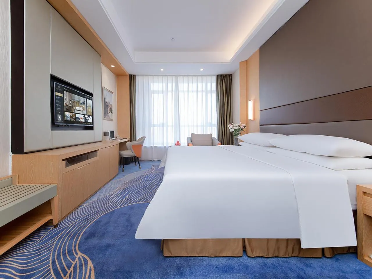 Bed in Vienna International Hotel Jingzhou New World