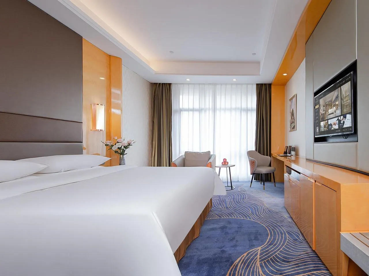 Bed in Vienna International Hotel Jingzhou New World
