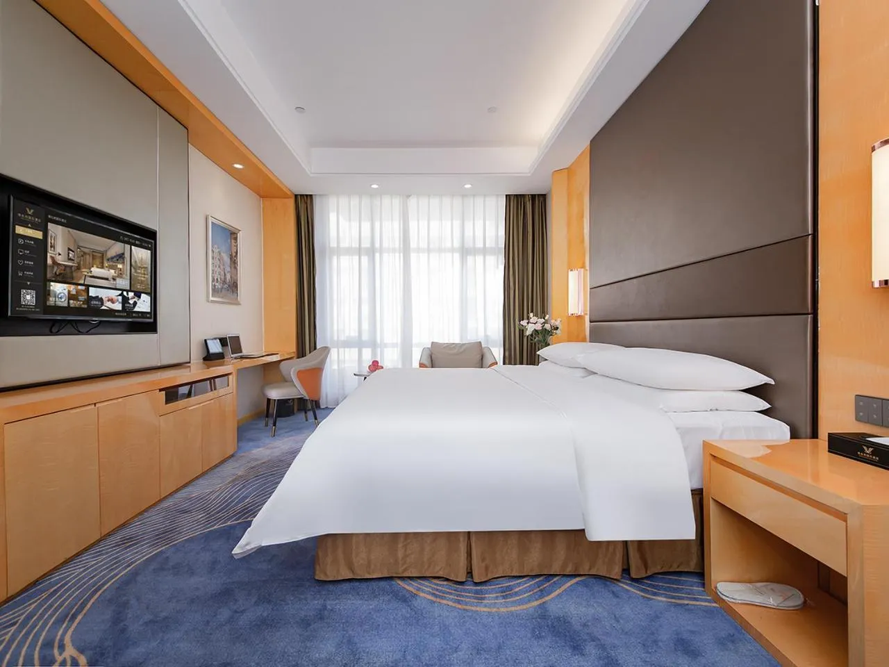 Bed in Vienna International Hotel Jingzhou New World