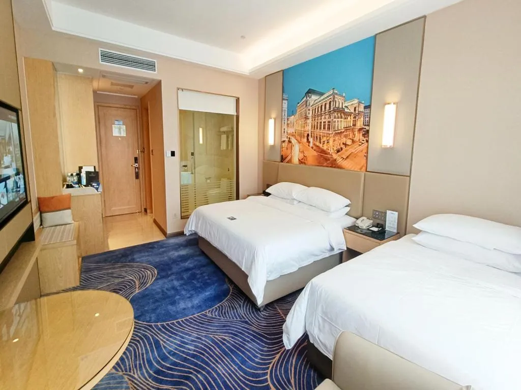 Bed in Vienna International Hotel Jingzhou New World