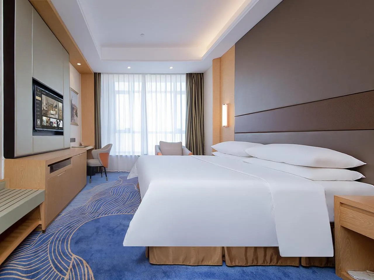 Bed in Vienna International Hotel Jingzhou New World