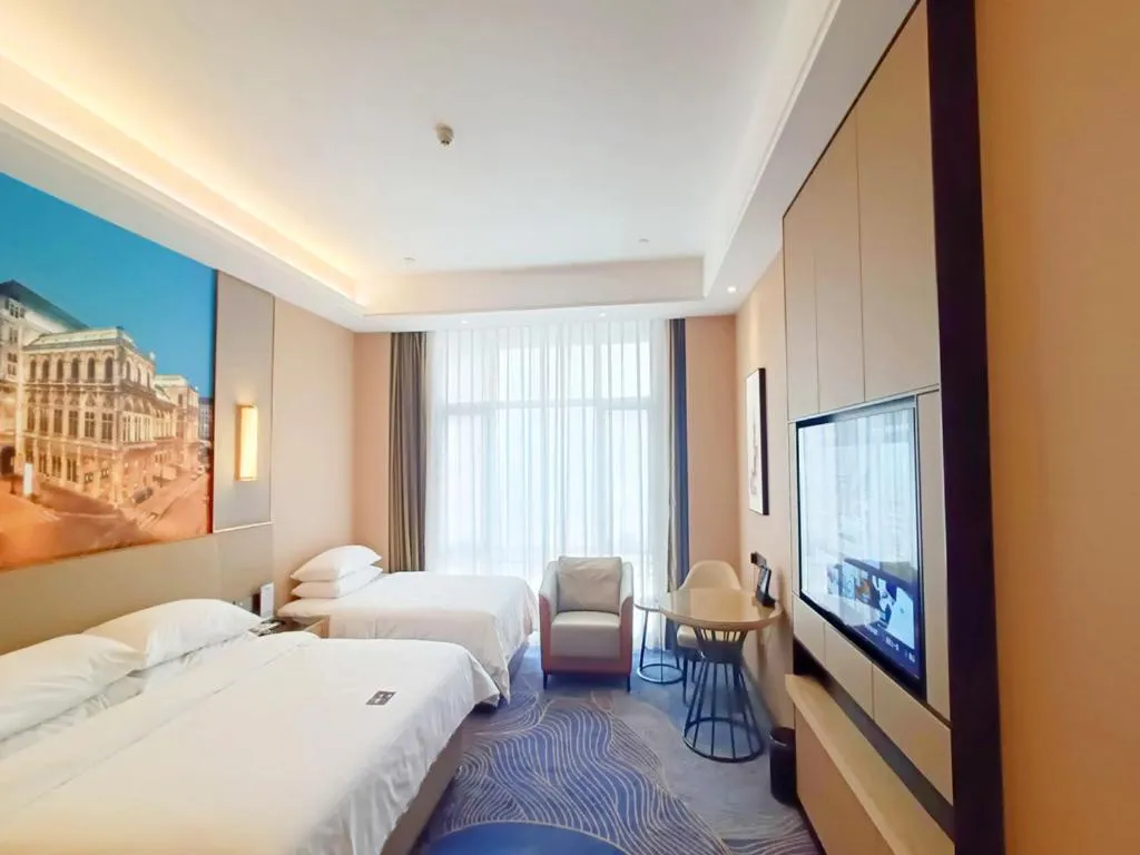 Bed in Vienna International Hotel Jingzhou New World