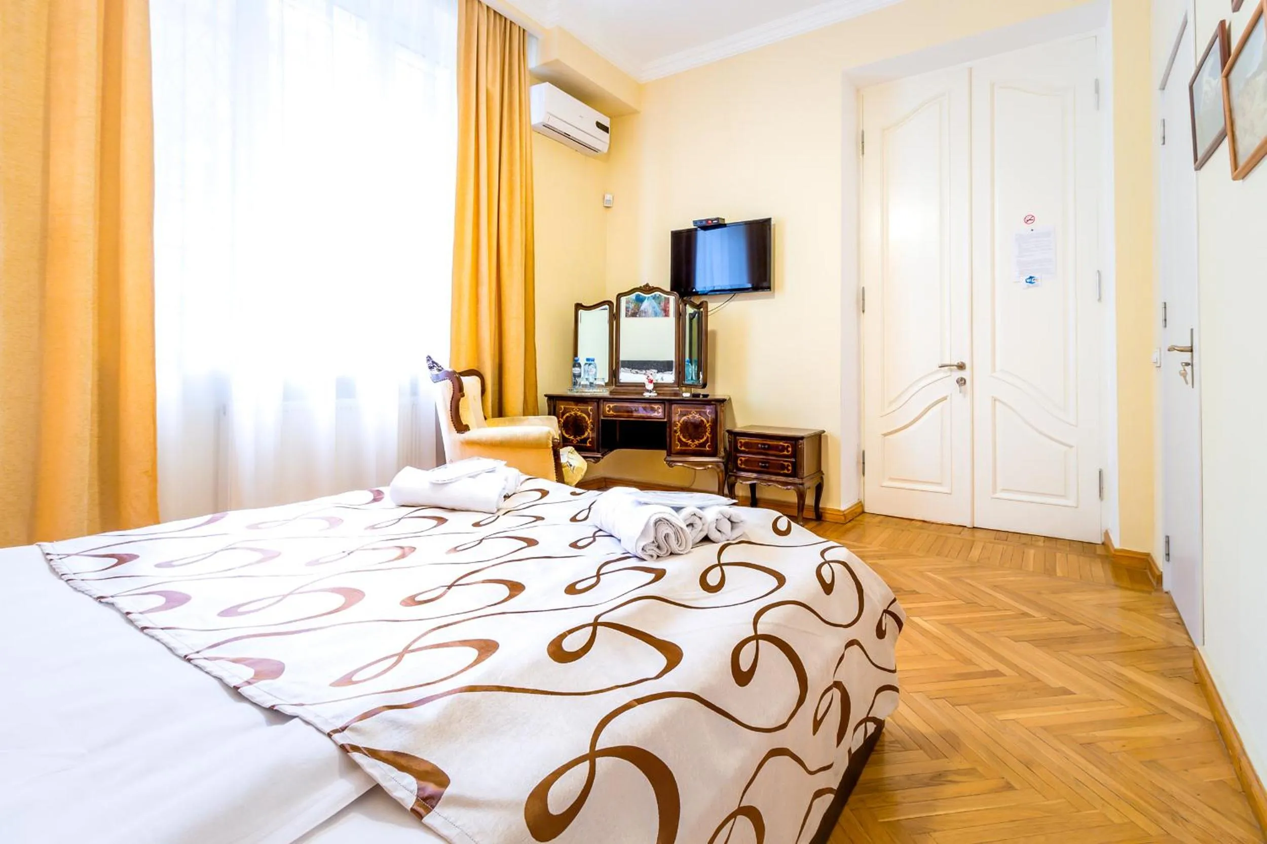 Bed in V Park Hotel