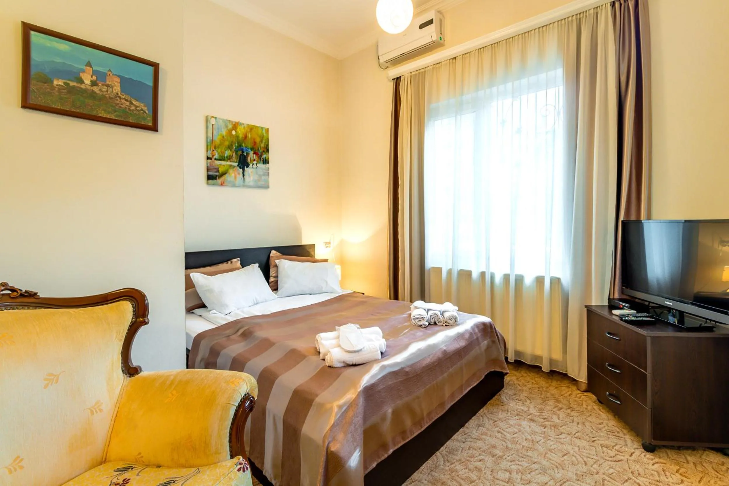 Bed in V Park Hotel
