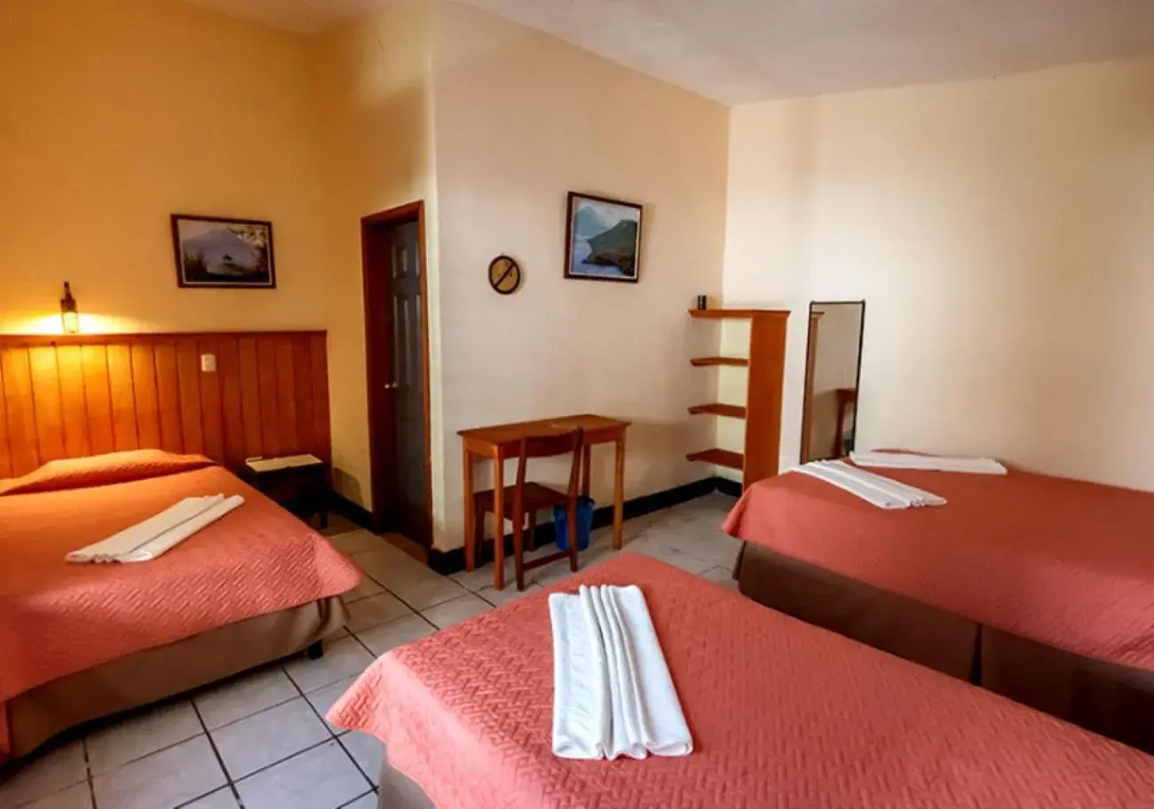 Quadruple Room with Garden View in Hotel Sak'cari El Amanecer Quadruple Room with Garden View in Hotel Sak'cari El Amanecer