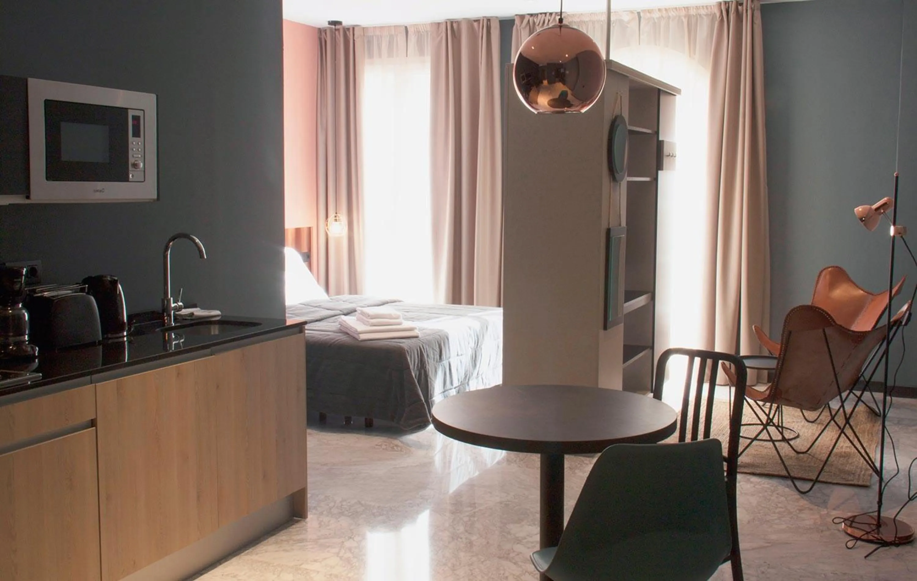 Coffee/tea facilities, Bed in Apartamentos NONO by Charming Stay