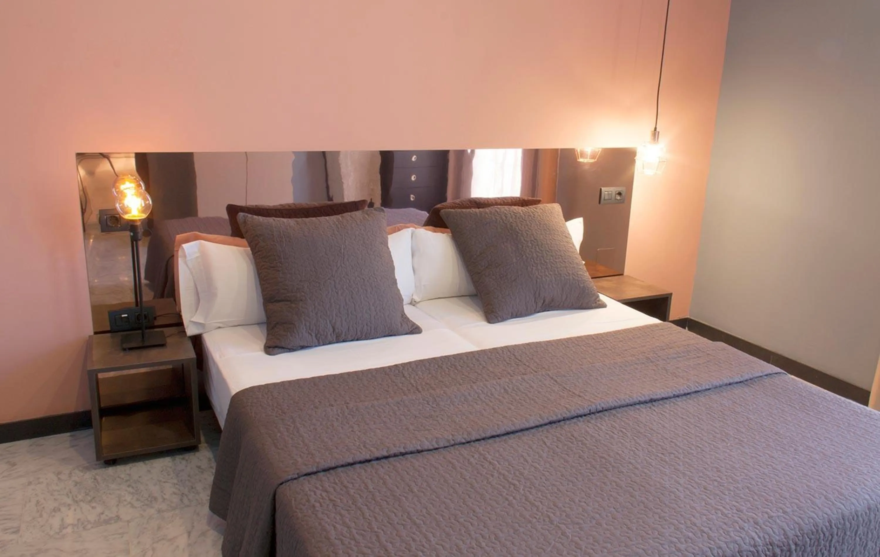 Bedroom, Bed in Apartamentos NONO by Charming Stay