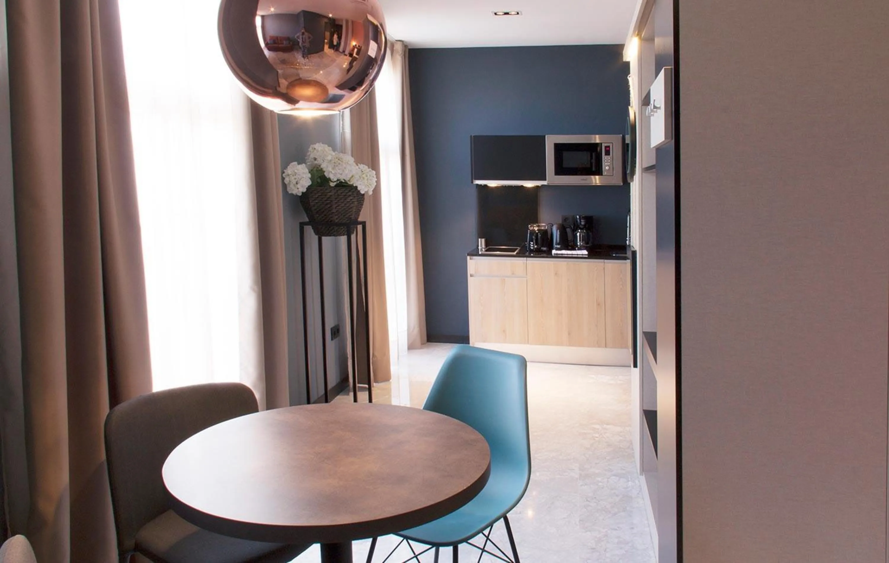 Kitchen or kitchenette in Apartamentos NONO by Charming Stay