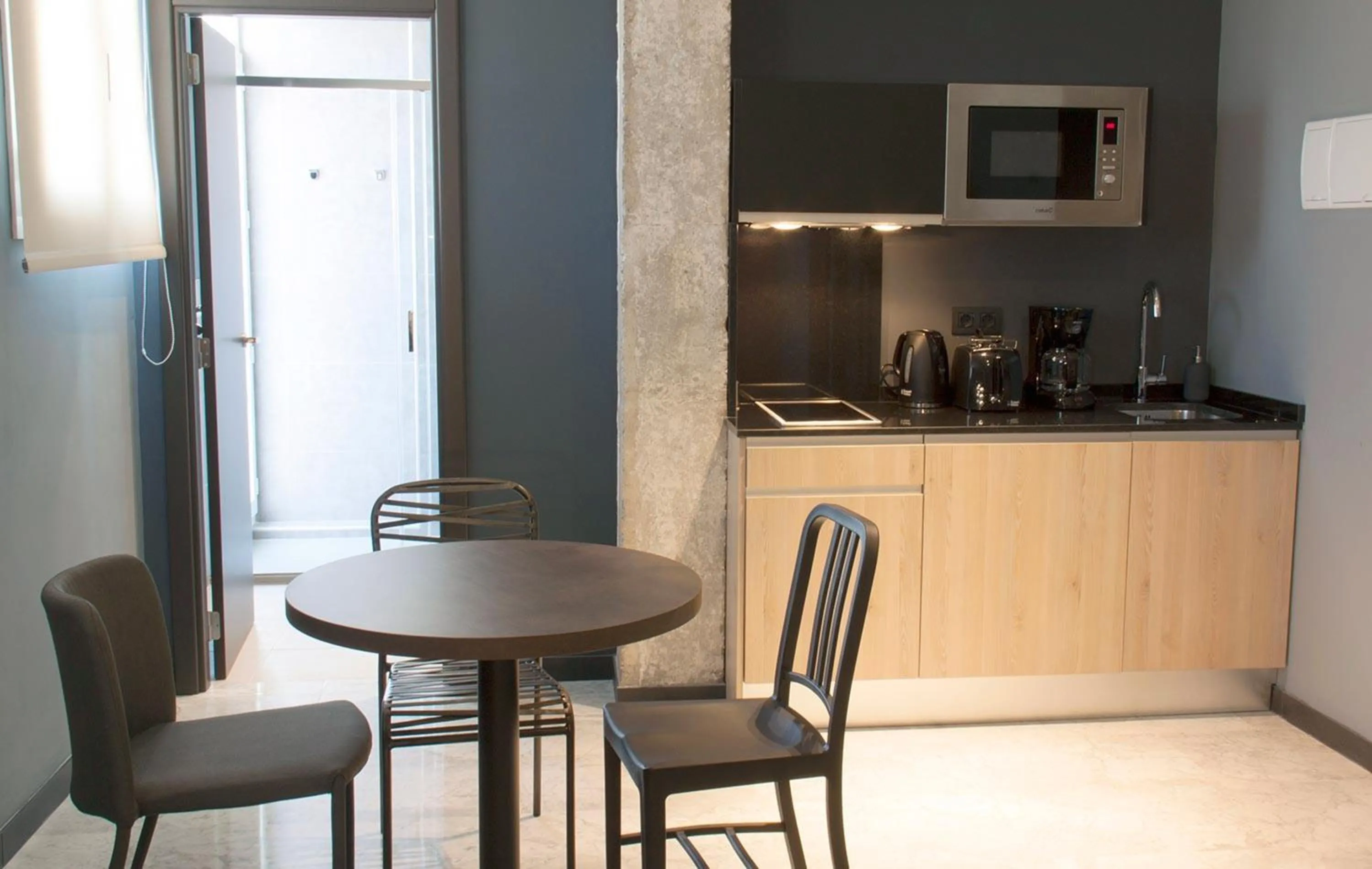 Kitchen or kitchenette in Apartamentos NONO by Charming Stay