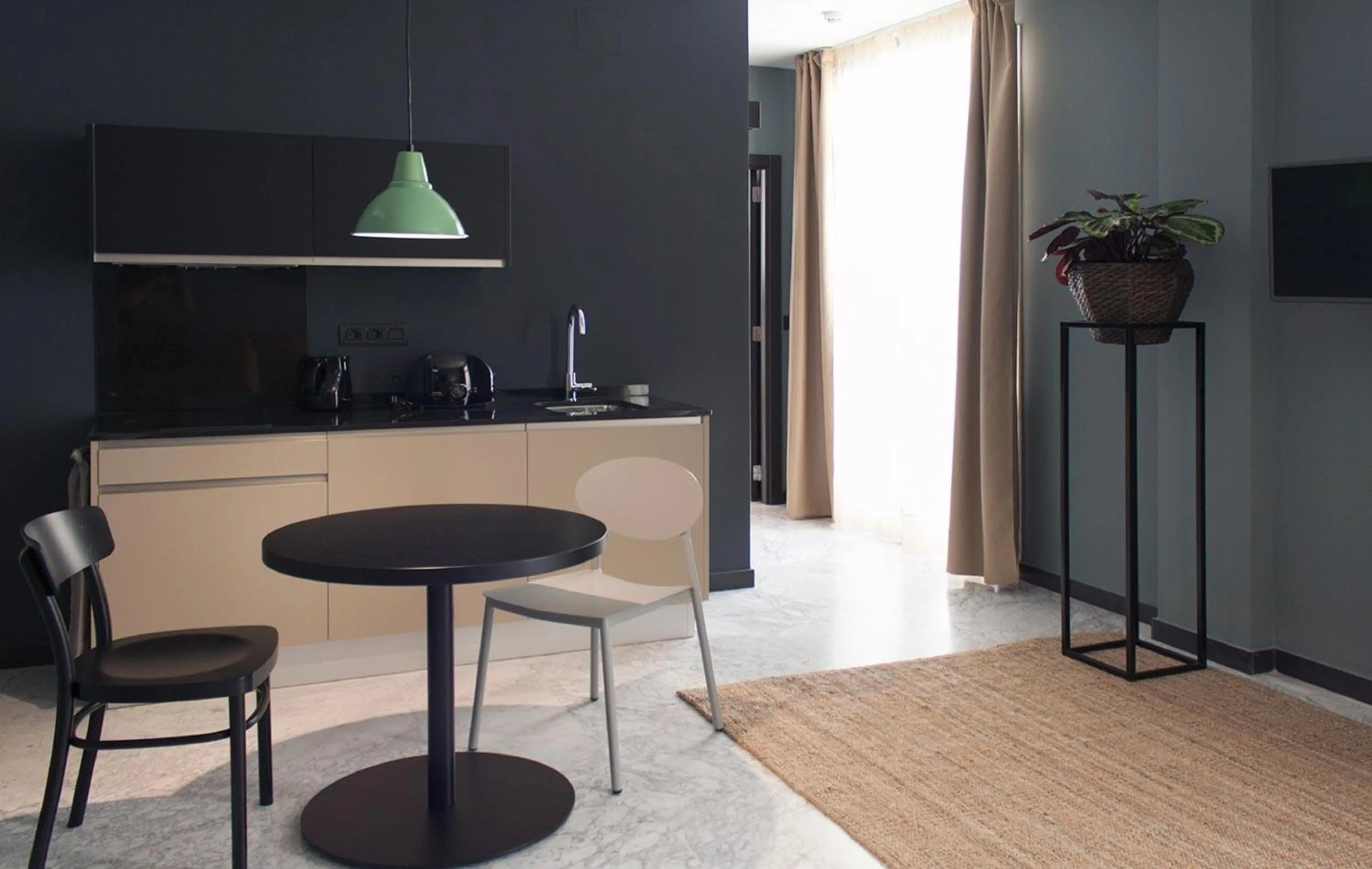 Kitchen or kitchenette in Apartamentos NONO by Charming Stay