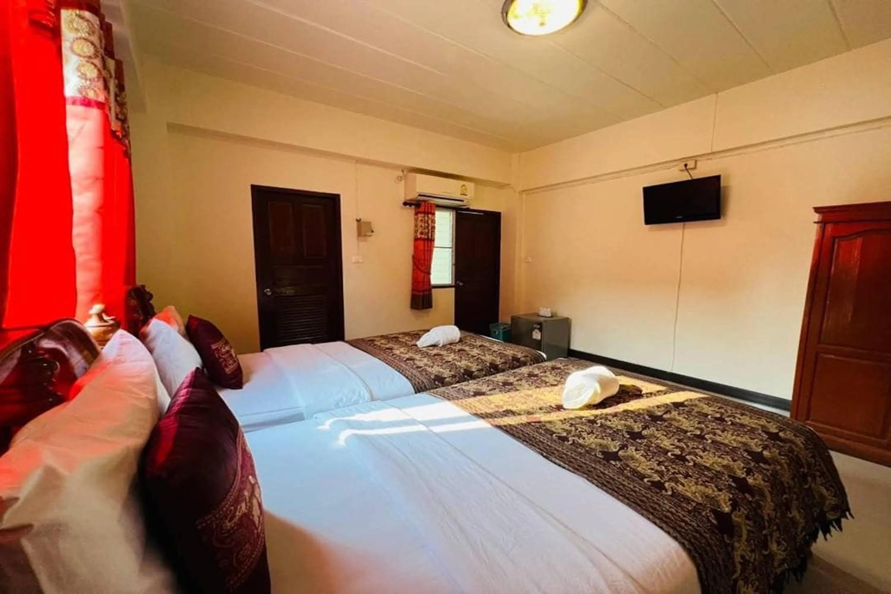 Bed in Baan Sabai Guesthouse