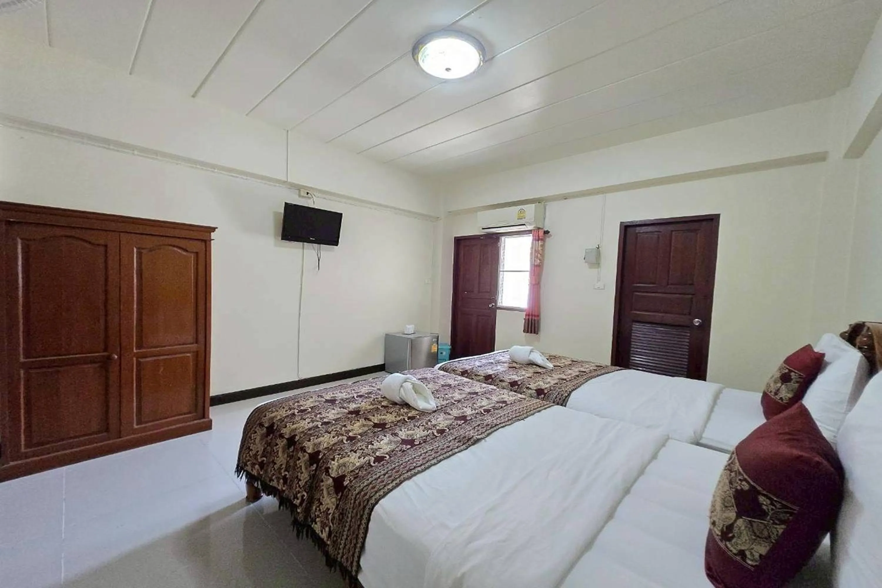 Bed in Baan Sabai Guesthouse