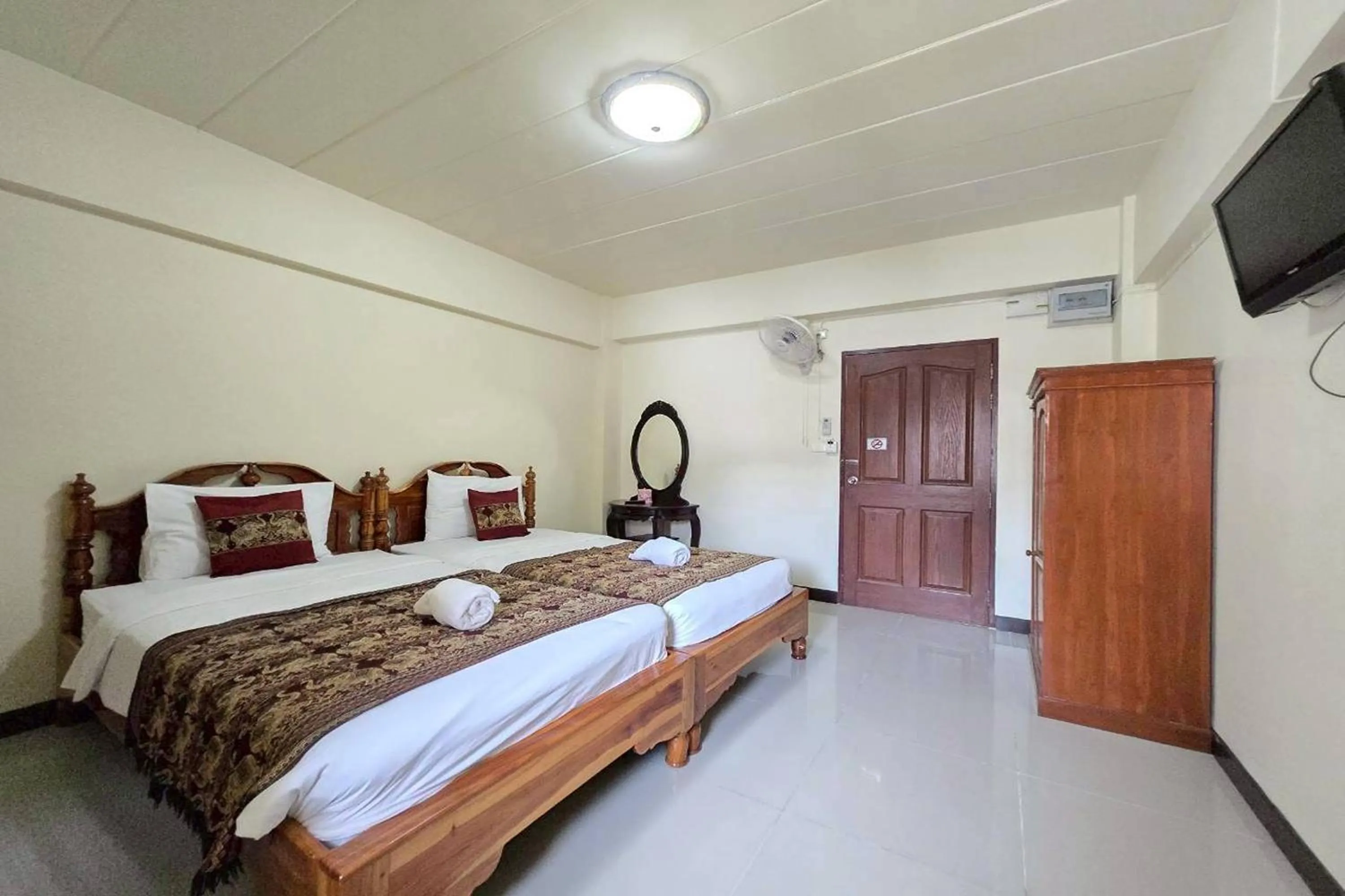 Bed in Baan Sabai Guesthouse