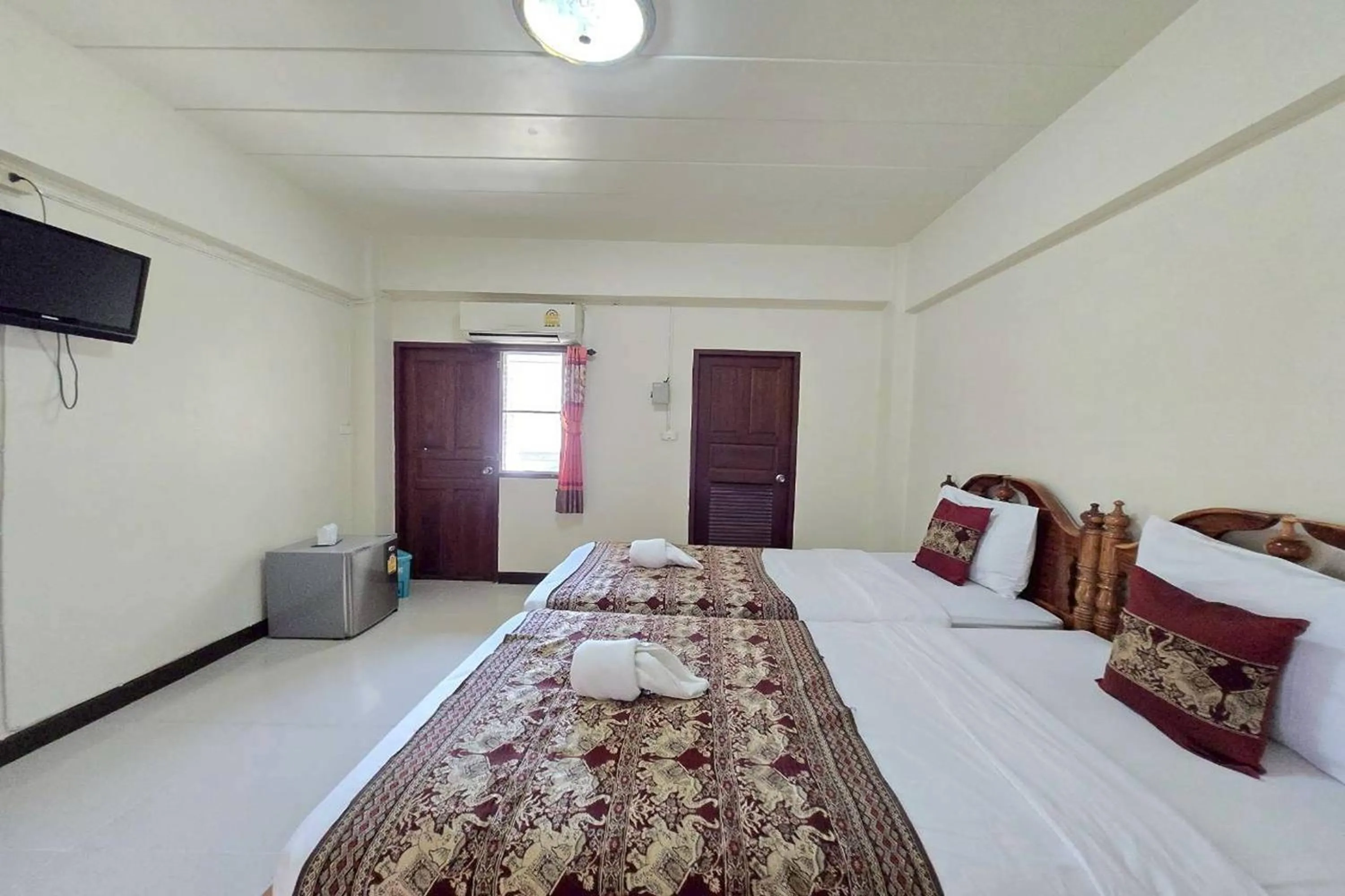 Bed in Baan Sabai Guesthouse