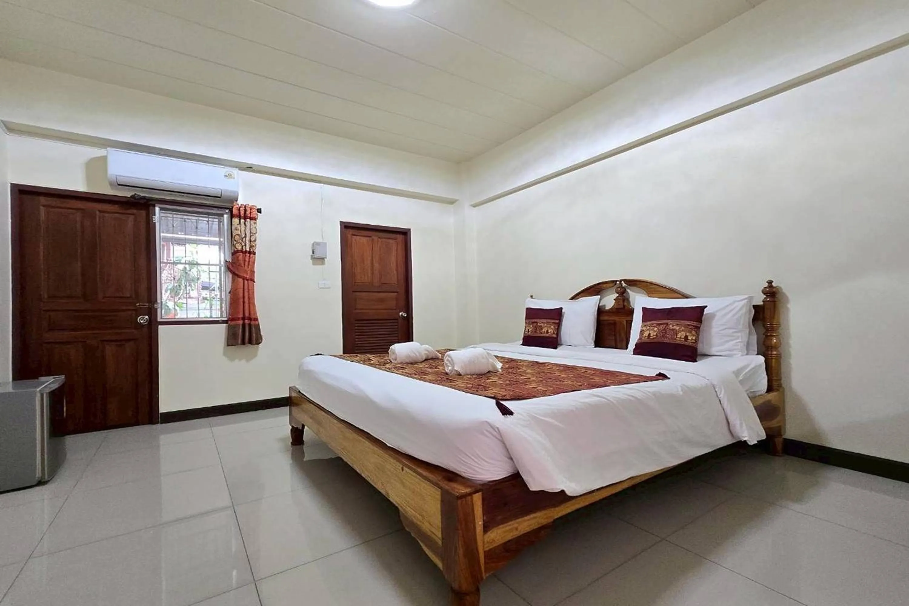Bed in Baan Sabai Guesthouse