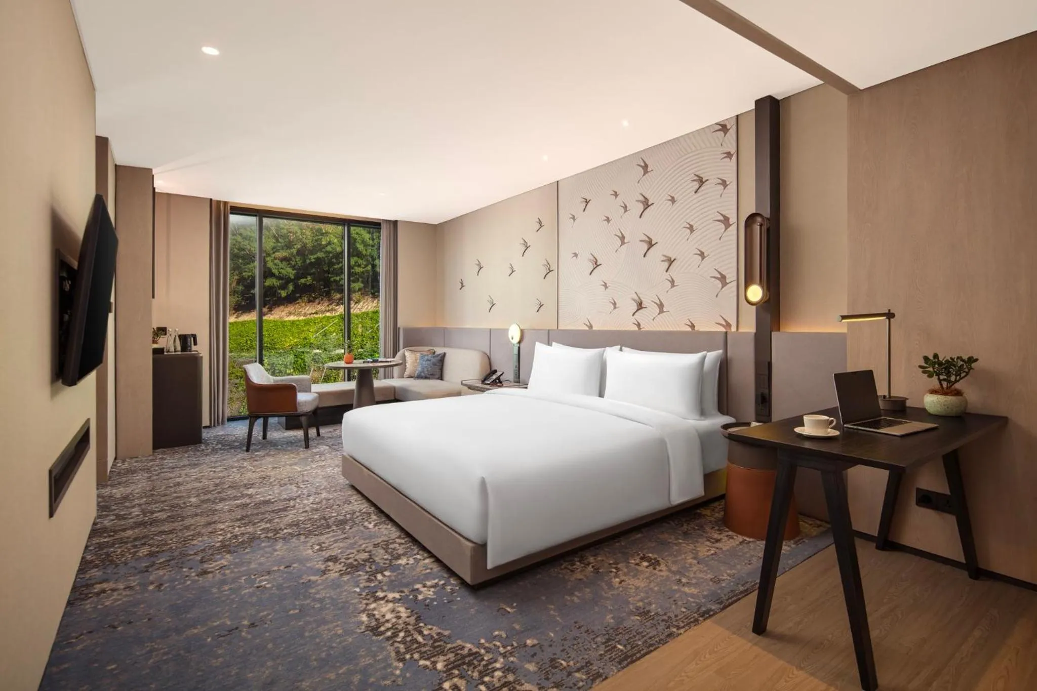 Photo of the whole room, Bed in Crowne Plaza Labuan Bajo by IHG