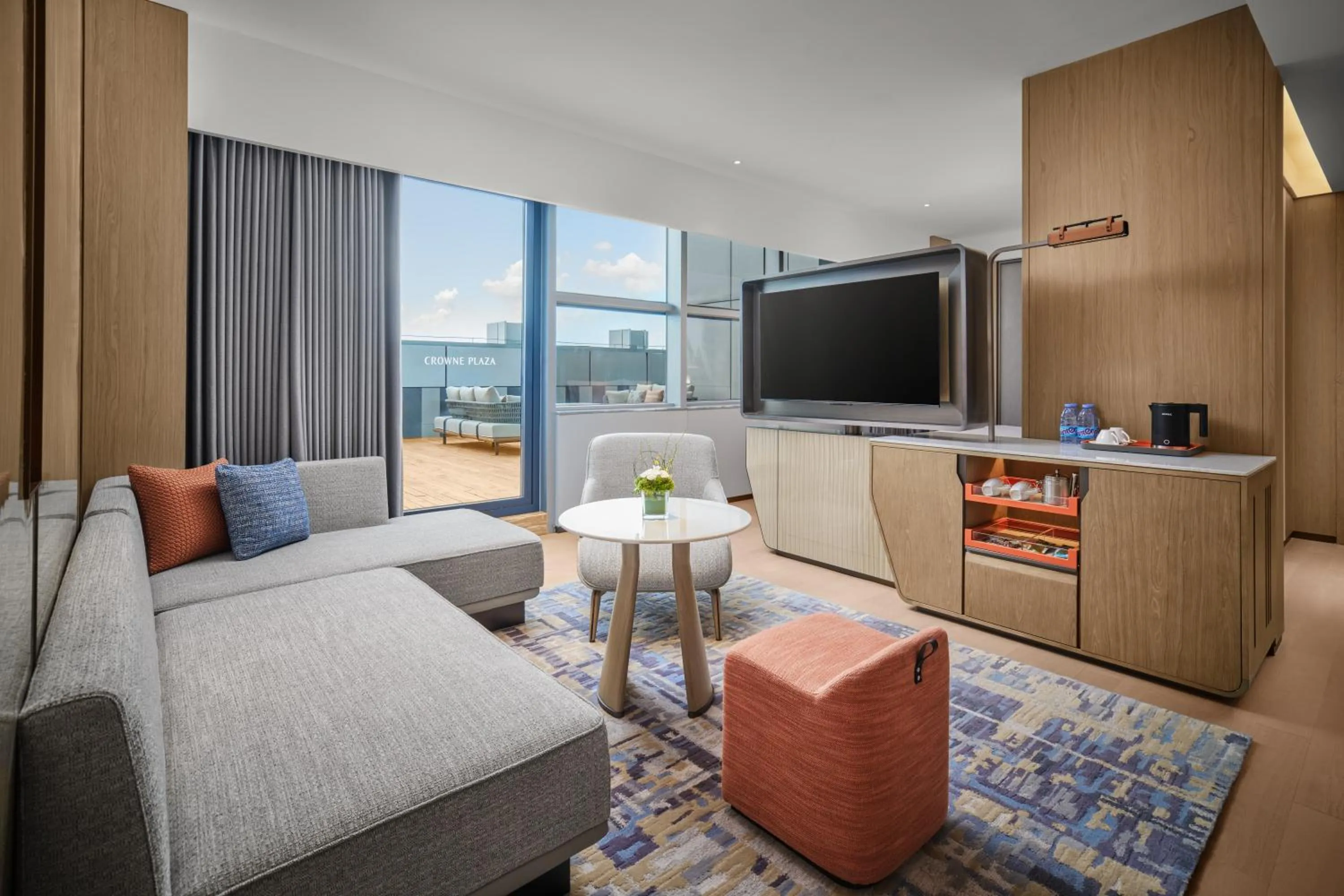 Living room in Crowne Plaza Zhongshan Torch High-tech Zone by IHG