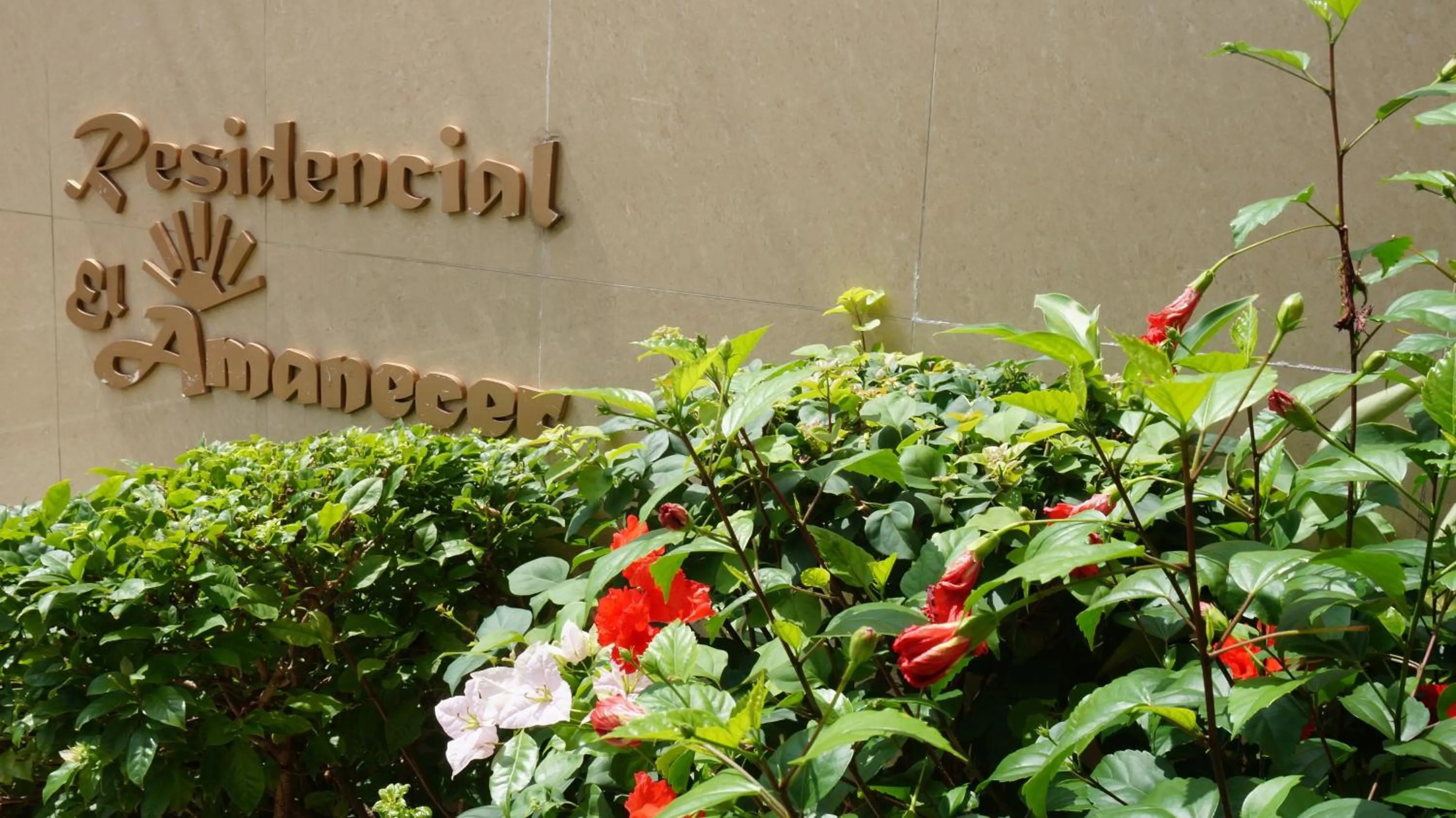 Property logo or sign in Residencial El Amanecer