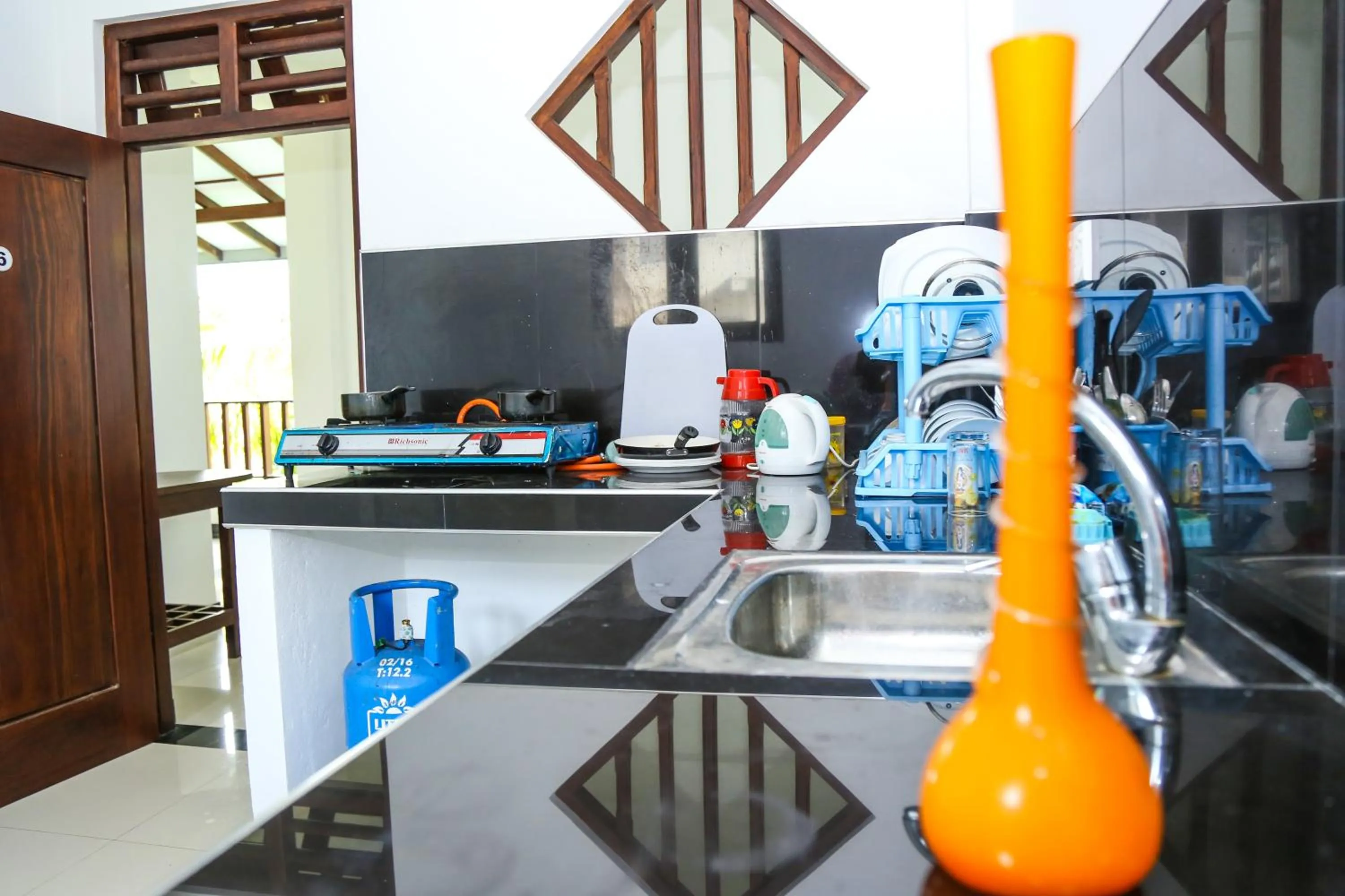 Kitchen or kitchenette in Tinara River Inn, Weligama