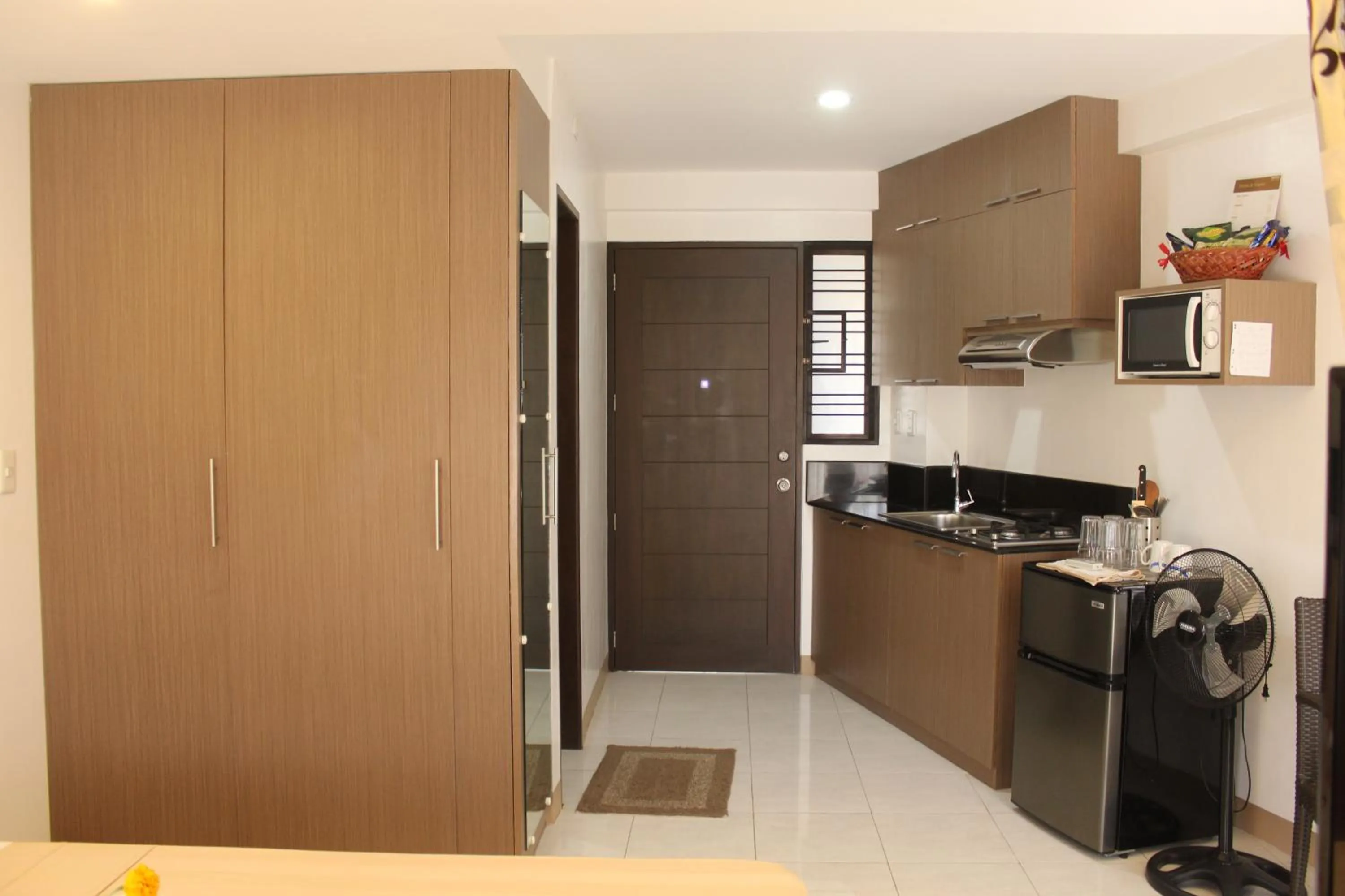 Kitchen or kitchenette in Anahaw Studio Suites
