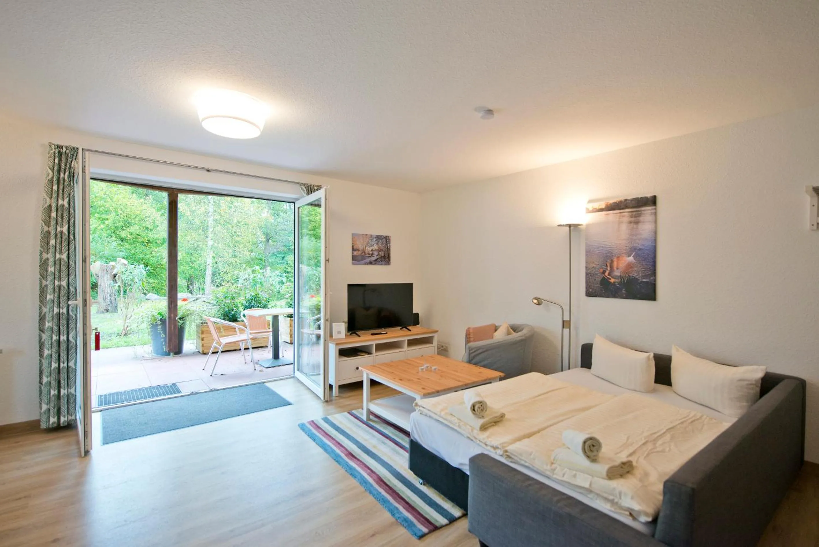 Living room, Bed in Müritzparadies - Feriendorf Alte Fahrt