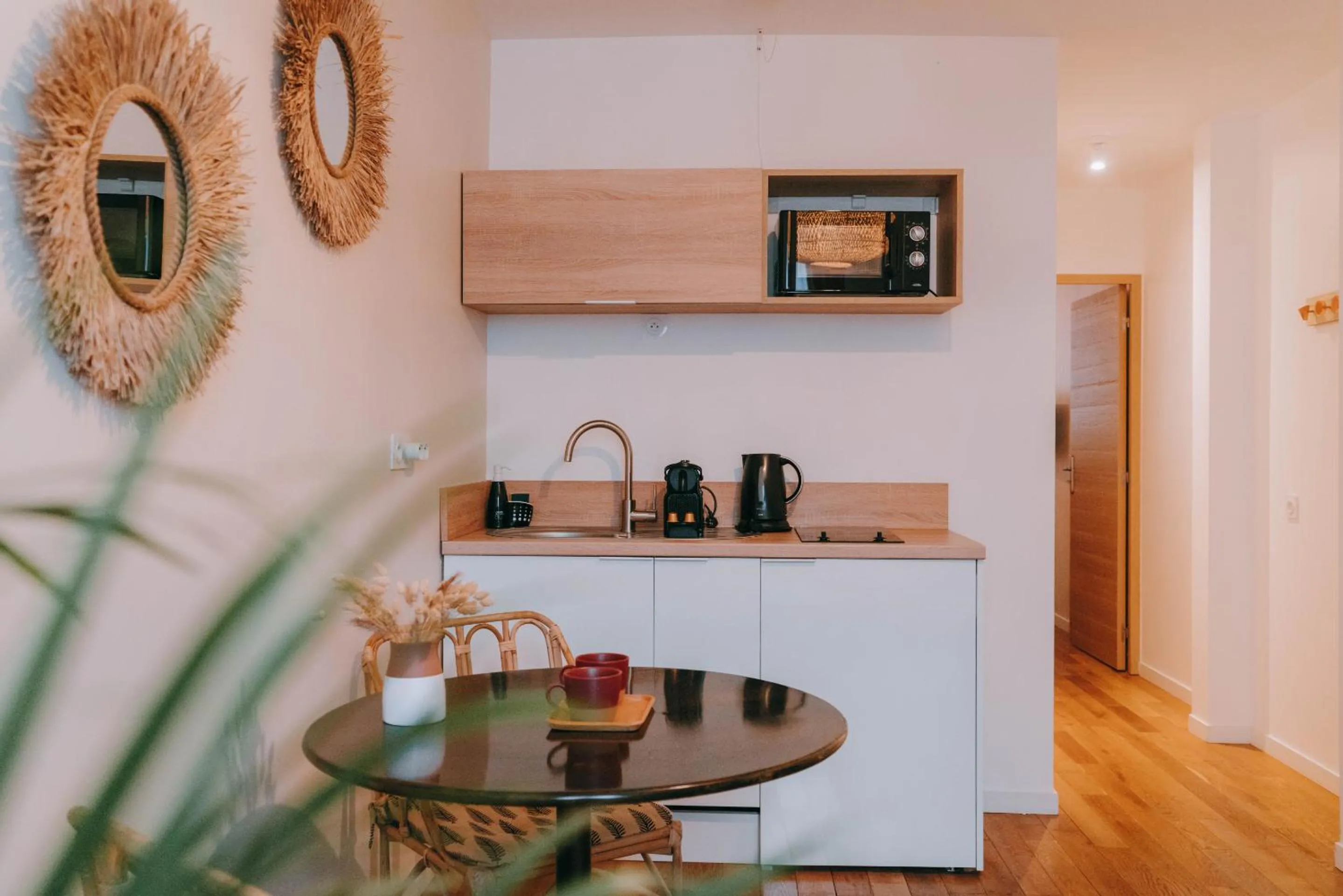 Kitchen or kitchenette in Apparts' Rennes BnB Solferino