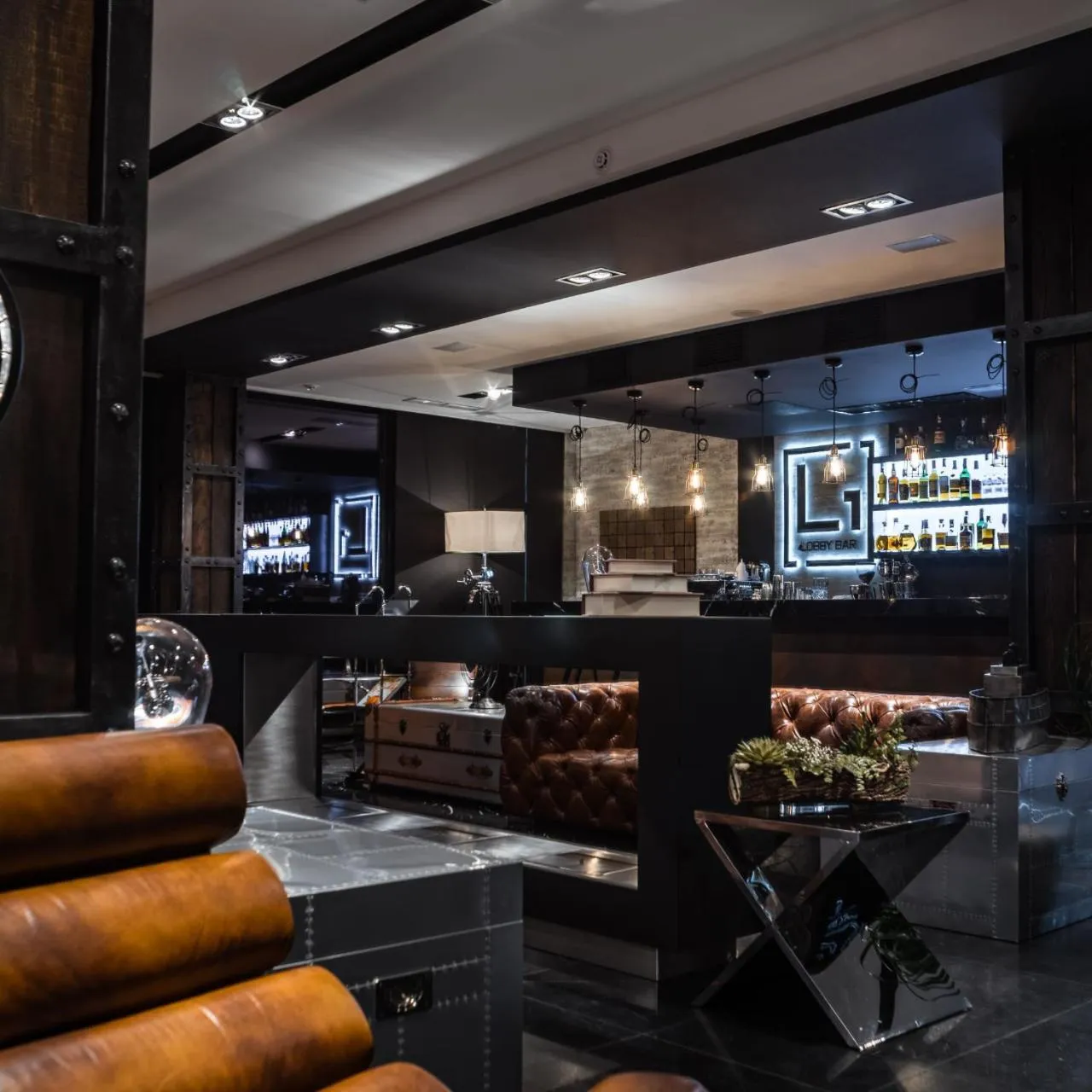 Communal lounge/ TV room in M1 Club Hotel