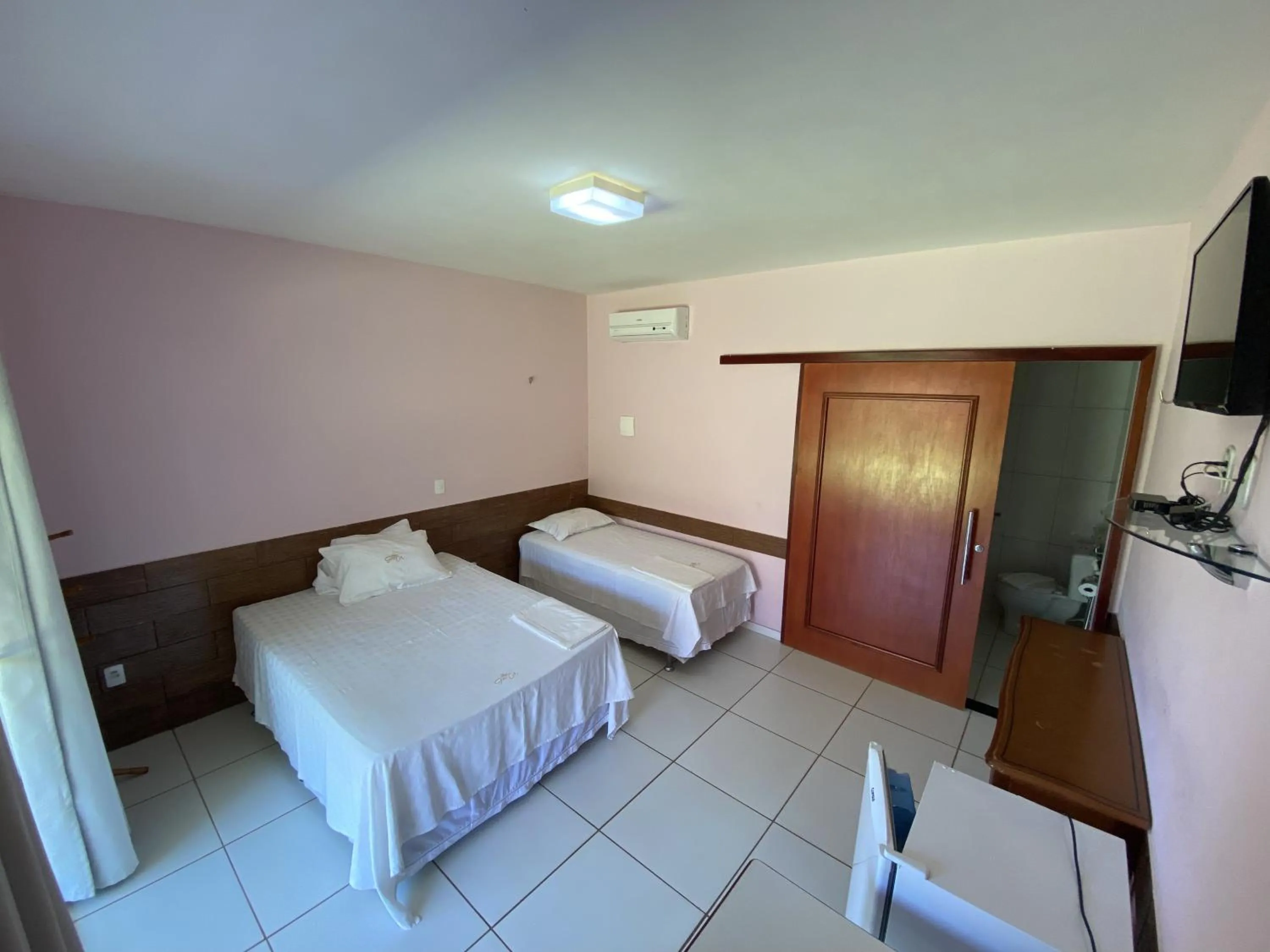 Property building, Bed in Pousada Gruta