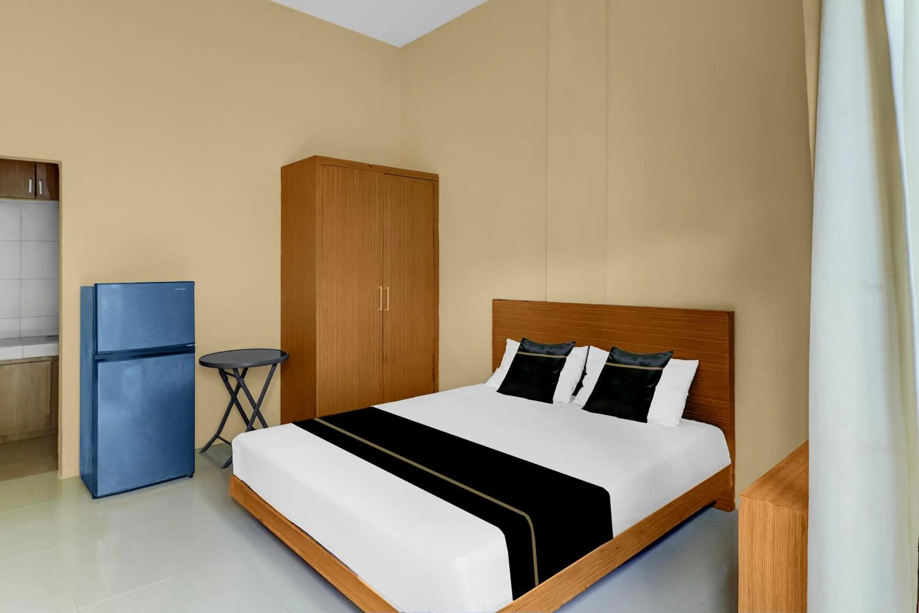 Bedroom, Bed in Hotel O near Trans Studio Theme Park formerly Cyloam Residence