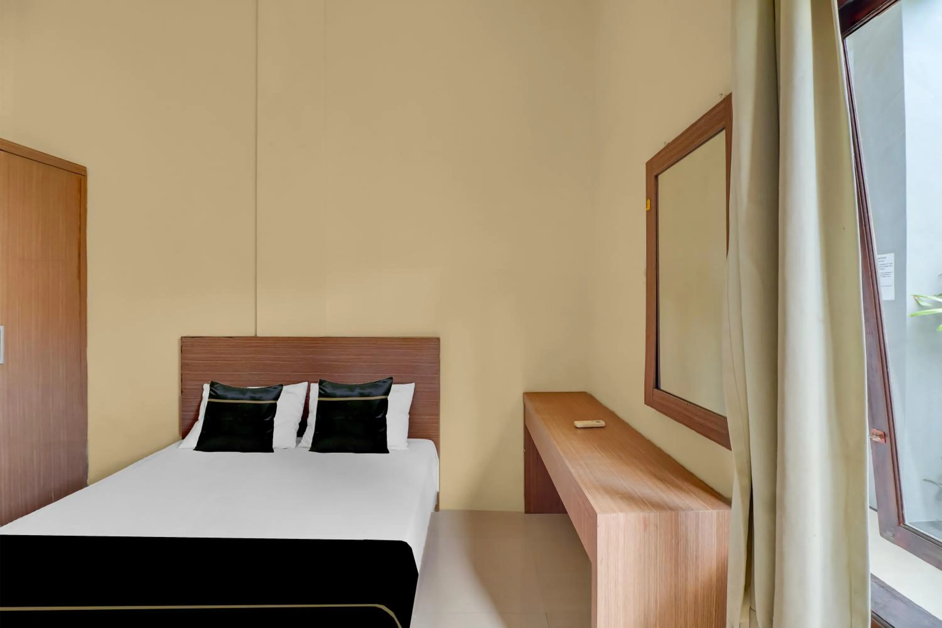 Bedroom, Bed in Hotel O near Trans Studio Theme Park formerly Cyloam Residence