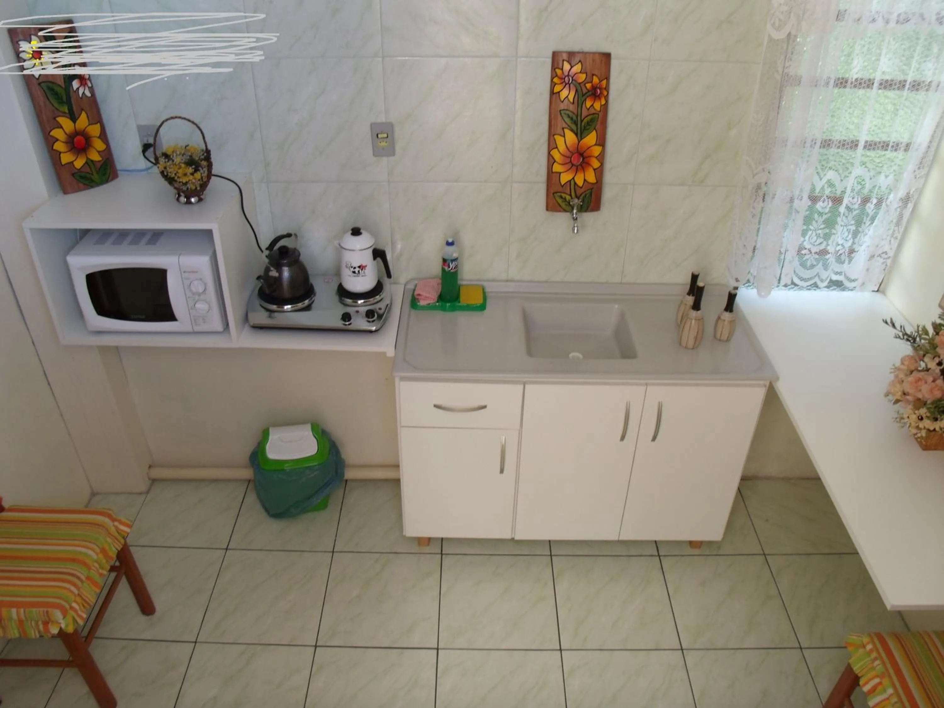 Kitchen or kitchenette in Pousada da Mari