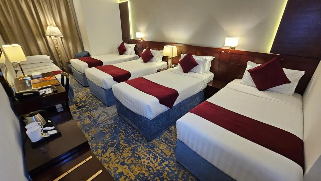 Bed in Jiwar Al Saha Hotel