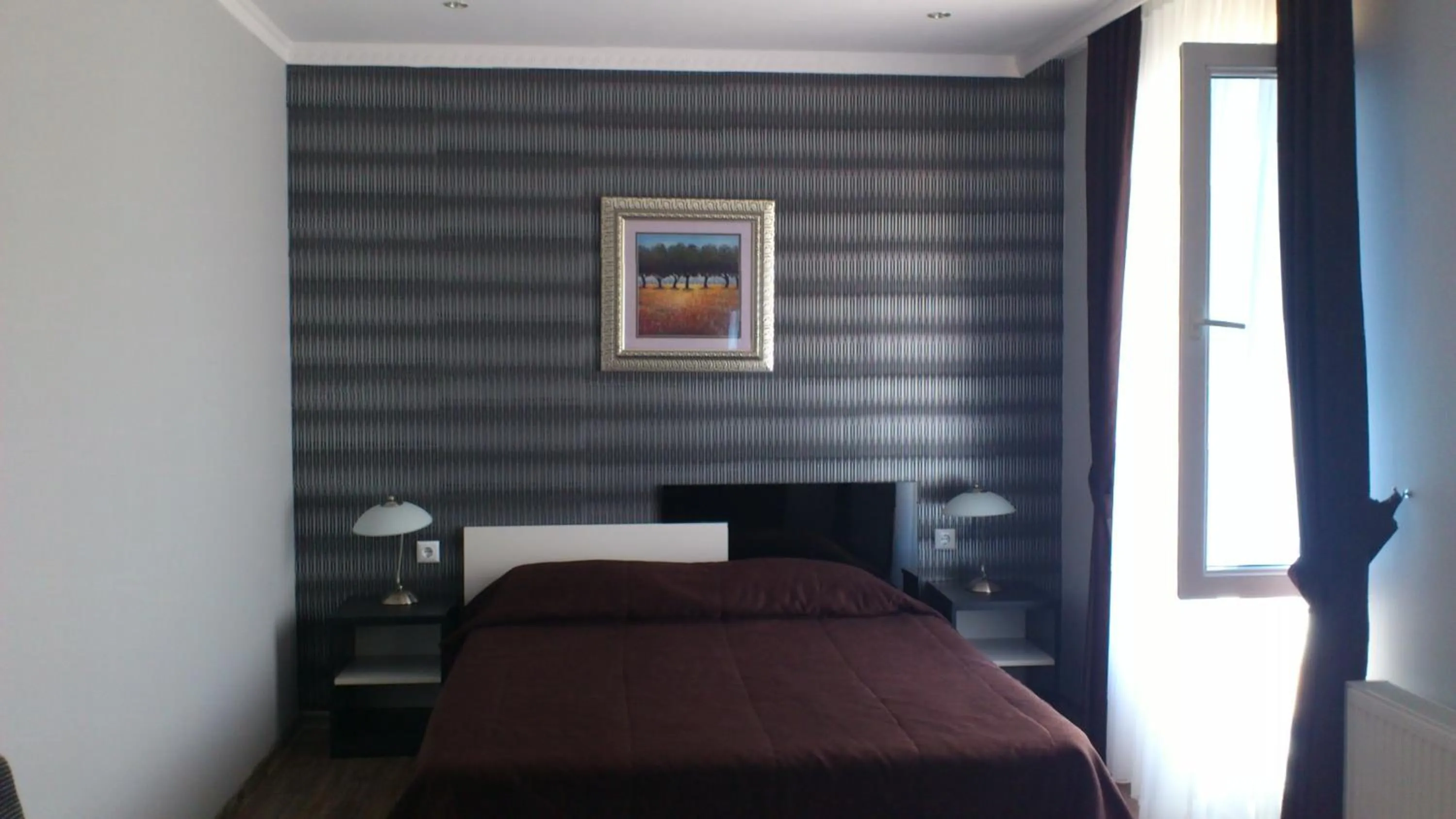 Bed in Hotel Mimoza