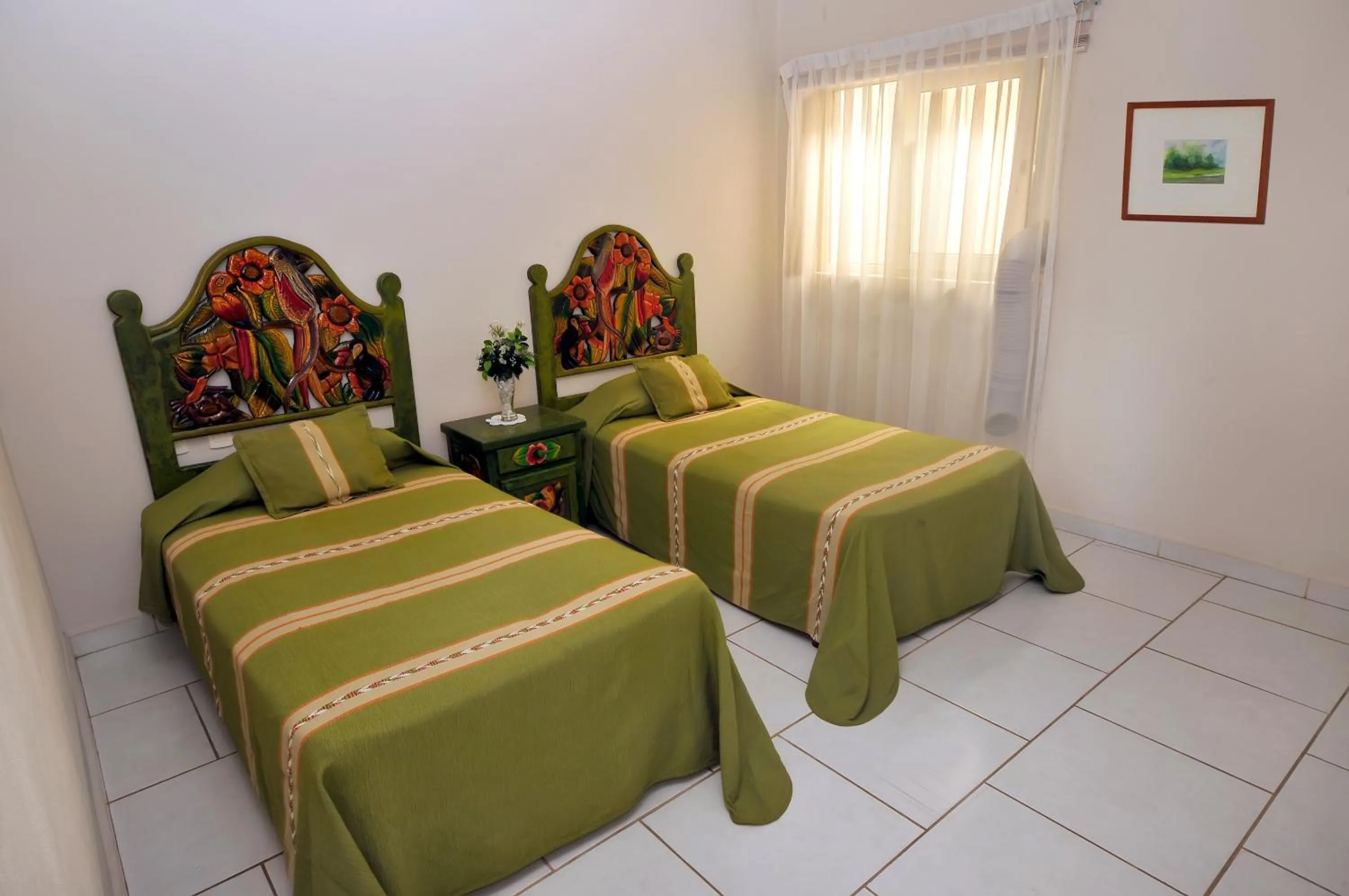 Bed in Marina Banderas Suites Hotel Boutique