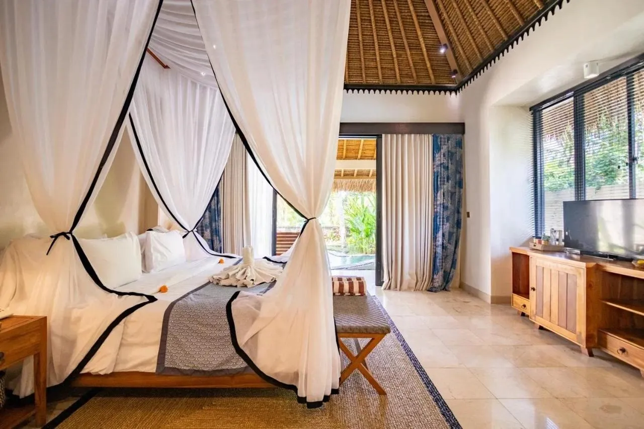 Bed in Mesari Hotel Ubud