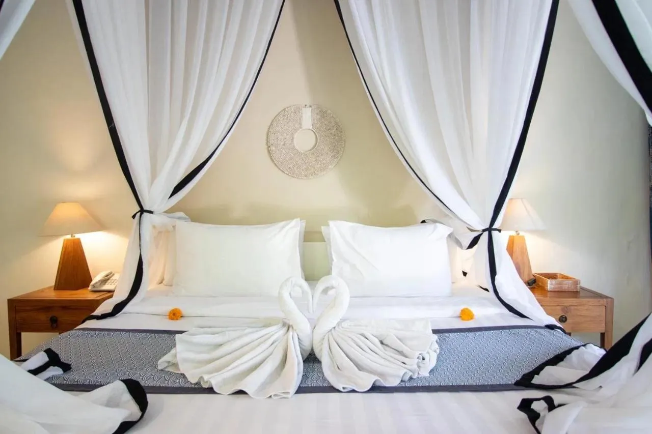 Bed in Mesari Hotel Ubud