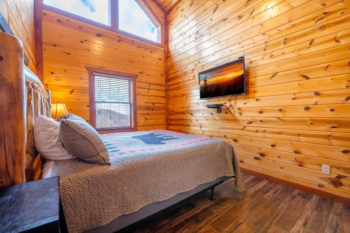 Bed in Splash Mountain Lodge By Avada Properties