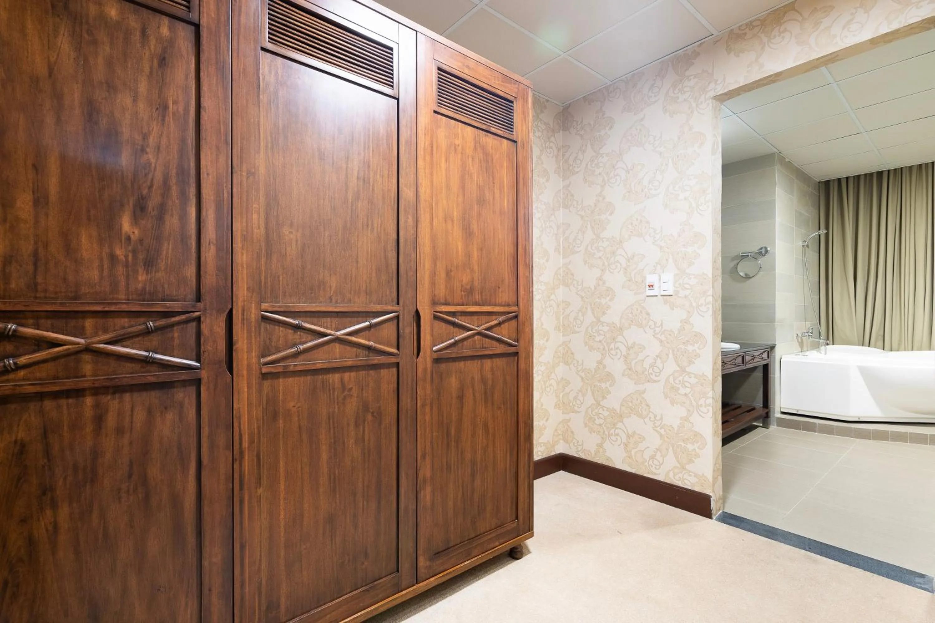 wardrobe, Bed in PHU MY HARBOUR HOTEL - Old Golf Phu My Hotel