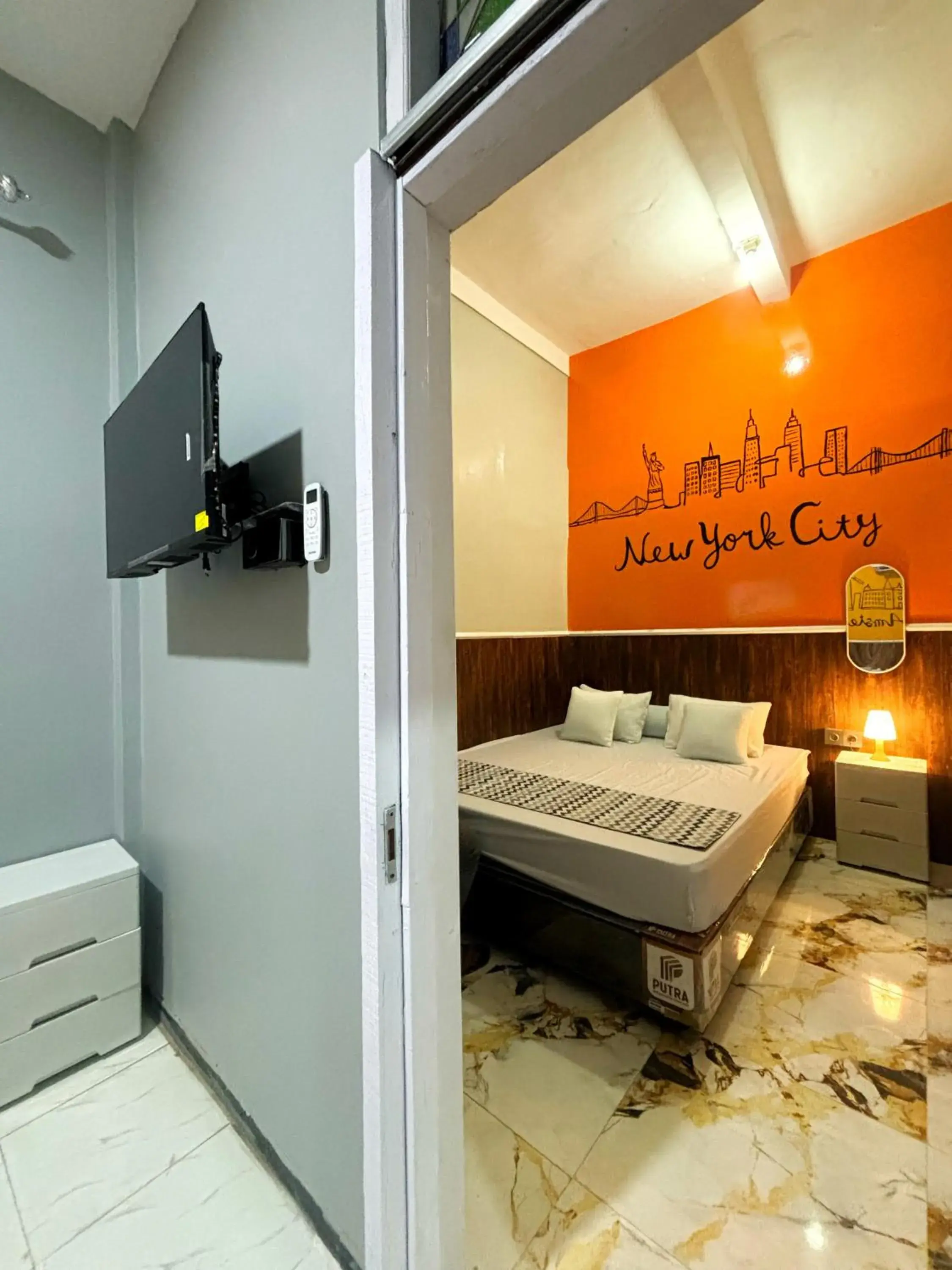 Deluxe Family Room in Semarang CoStay Deluxe Family Room in Semarang CoStay