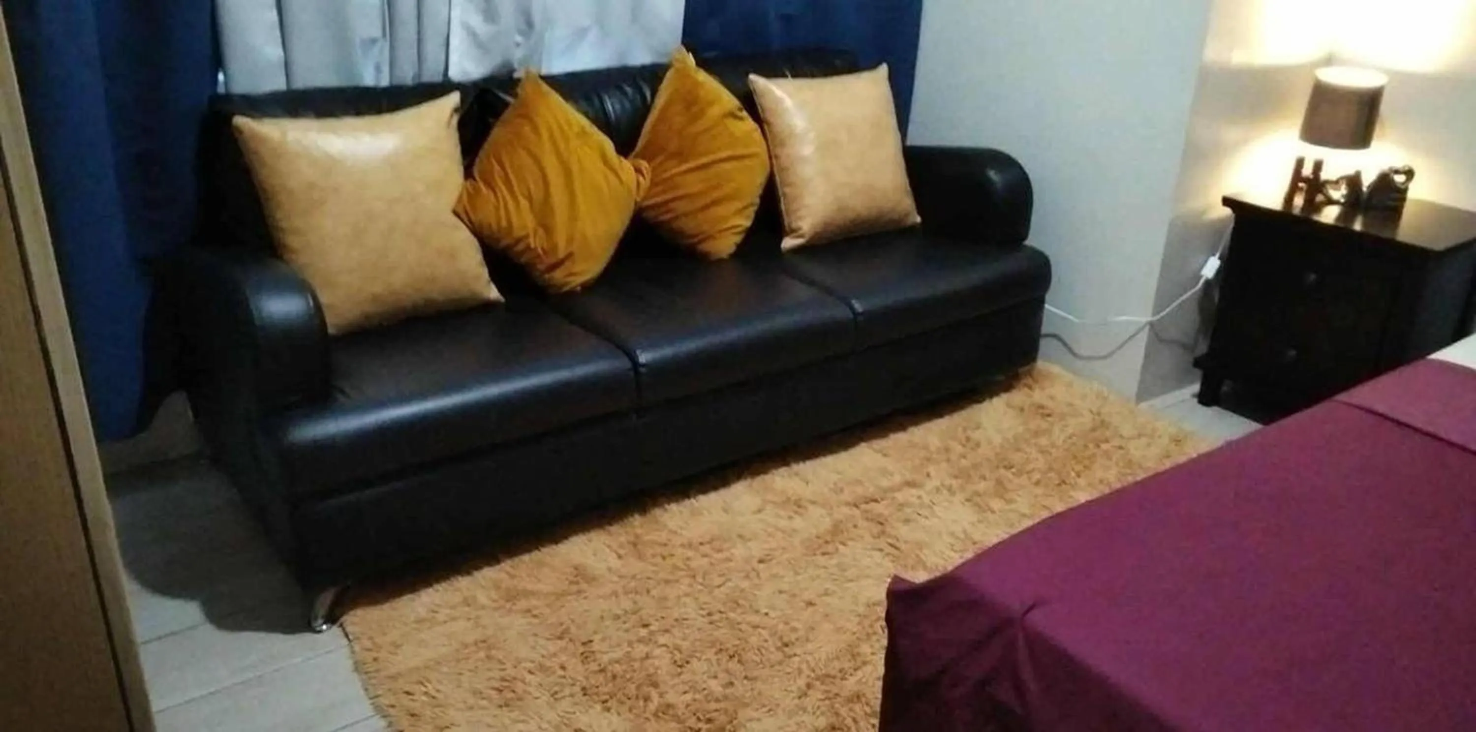 Seating area, Bed in 81 Newport Boulevard across NAIA T3 Airport