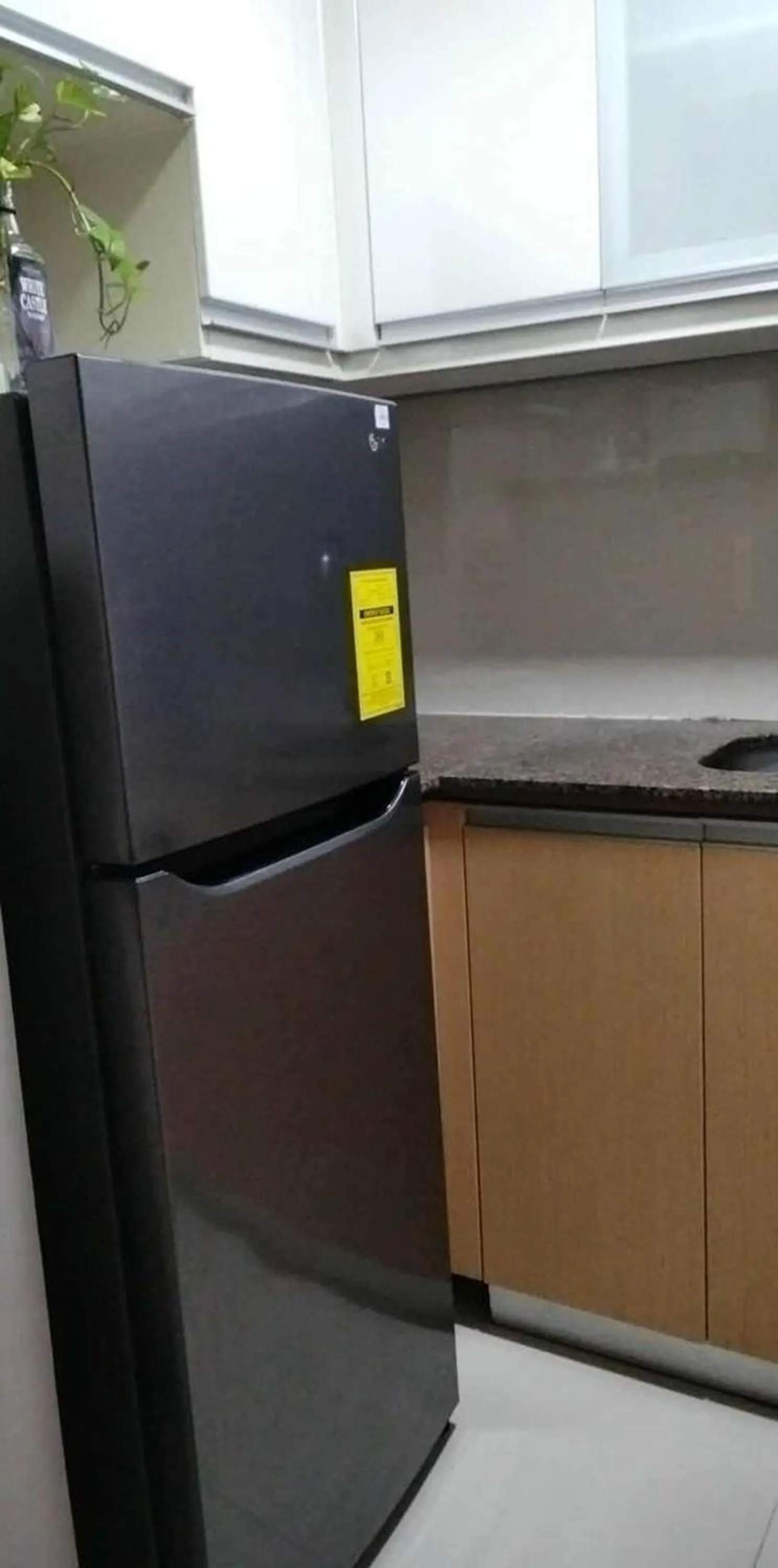 Kitchen or kitchenette in 81 Newport Boulevard across NAIA T3 Airport