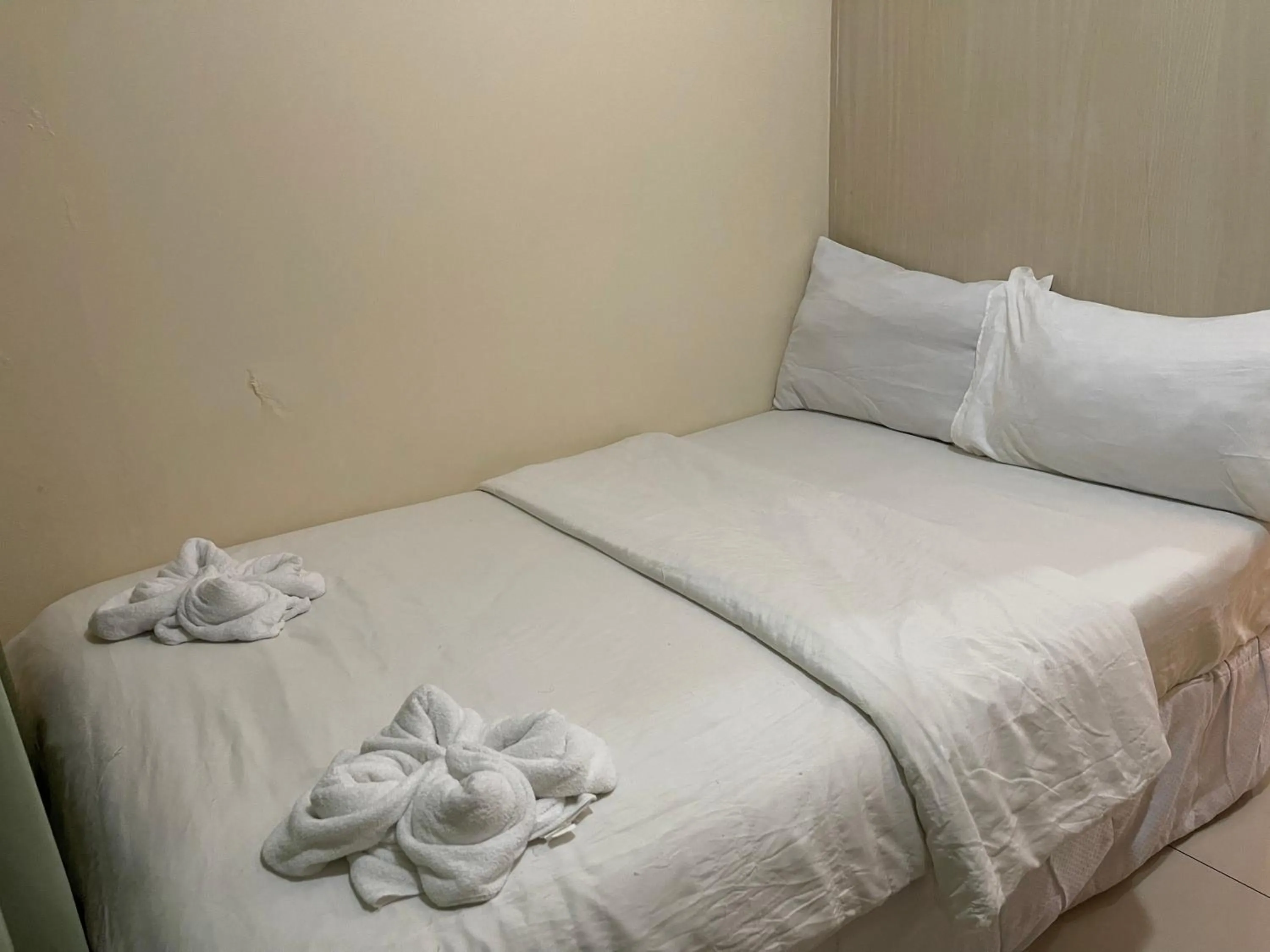 Bed in Premiere Haven MOA Staycation