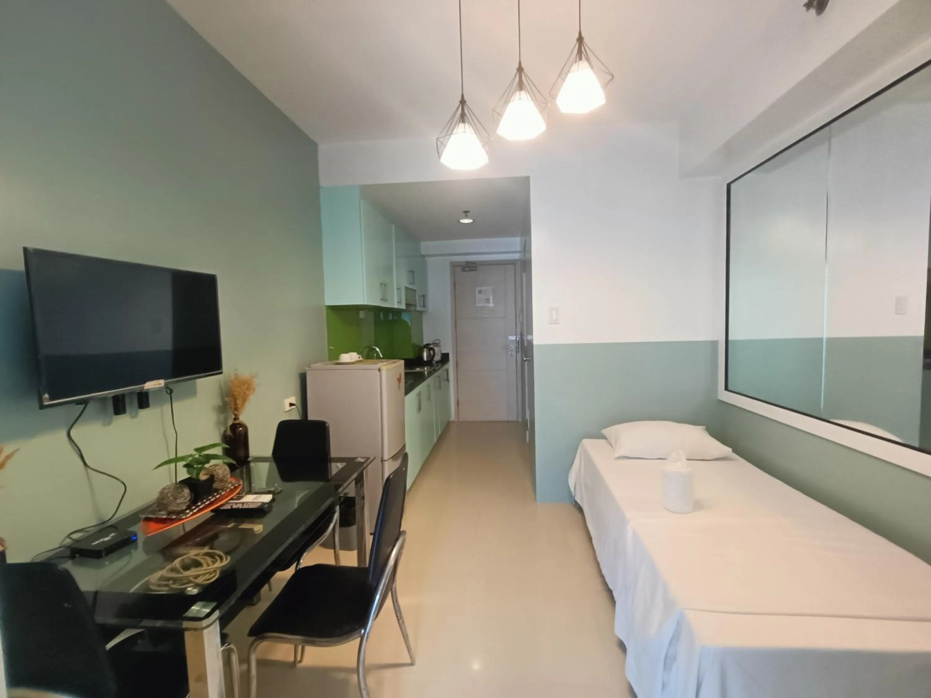 Bed in Premiere Haven MOA Staycation