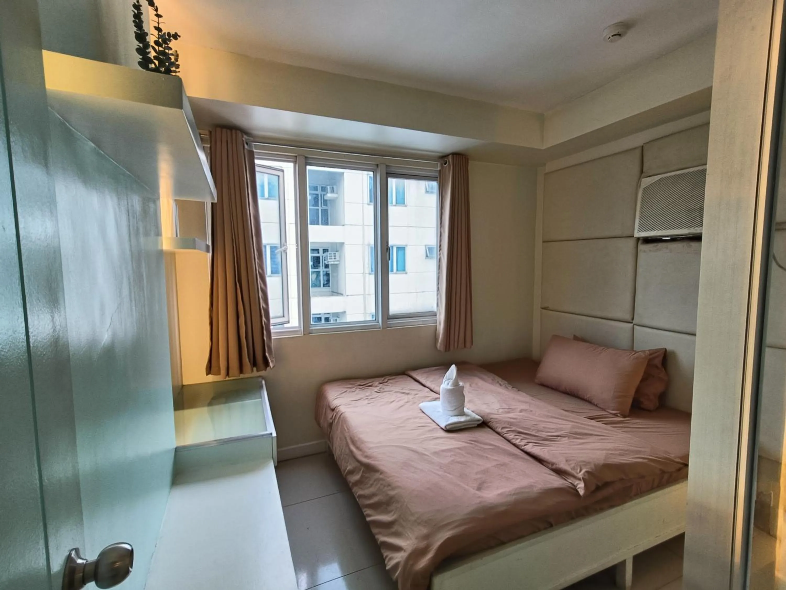 Bed in Premiere Haven MOA Staycation