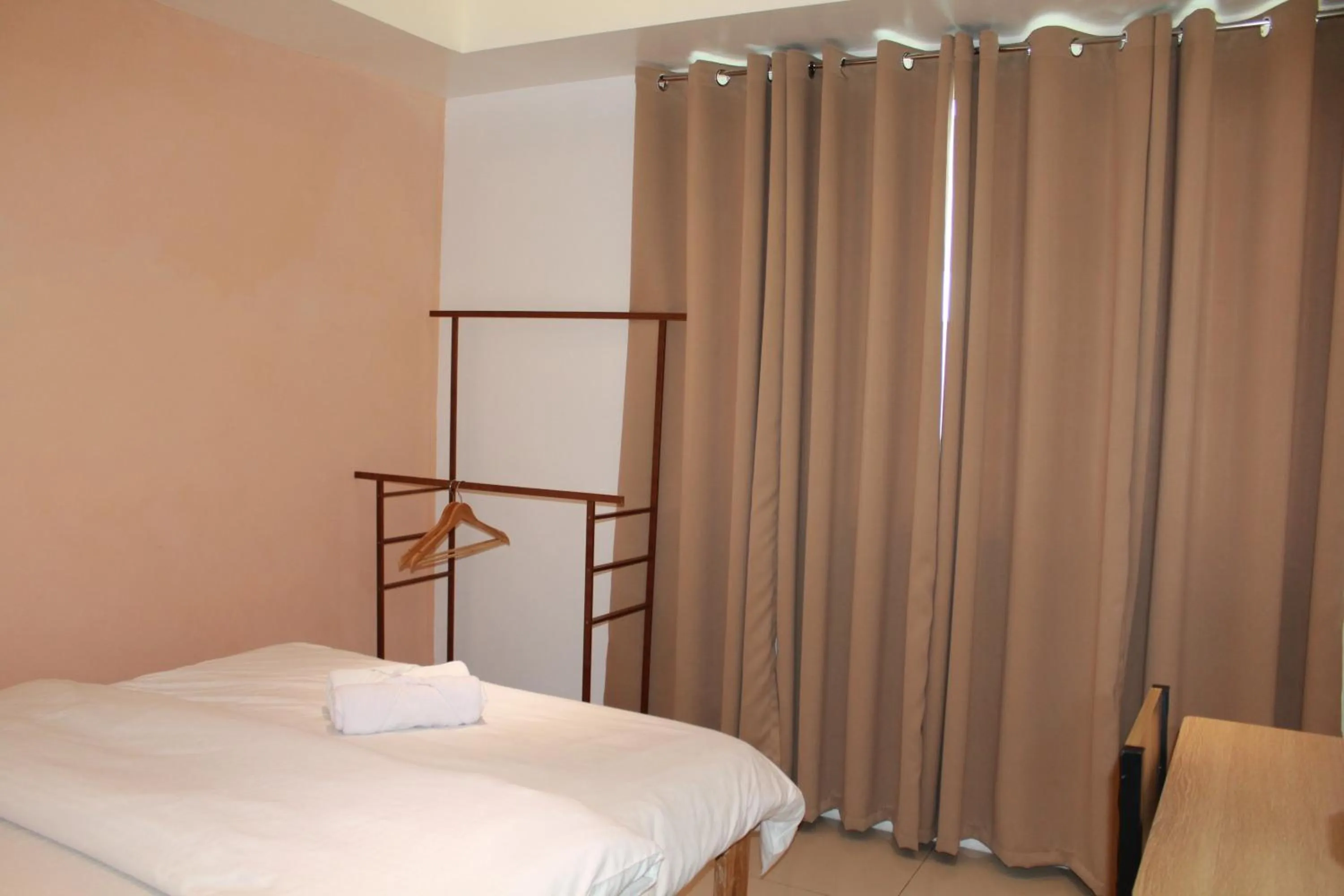 Bed in Premiere Haven MOA Staycation