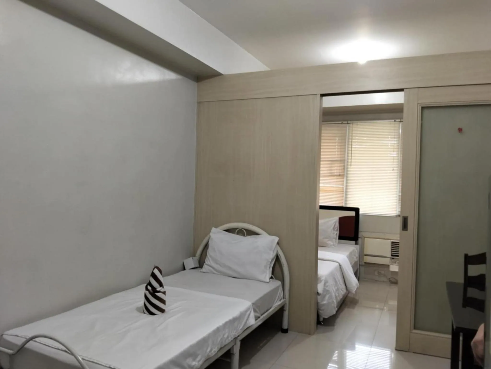 Bed in Premiere Haven MOA Staycation